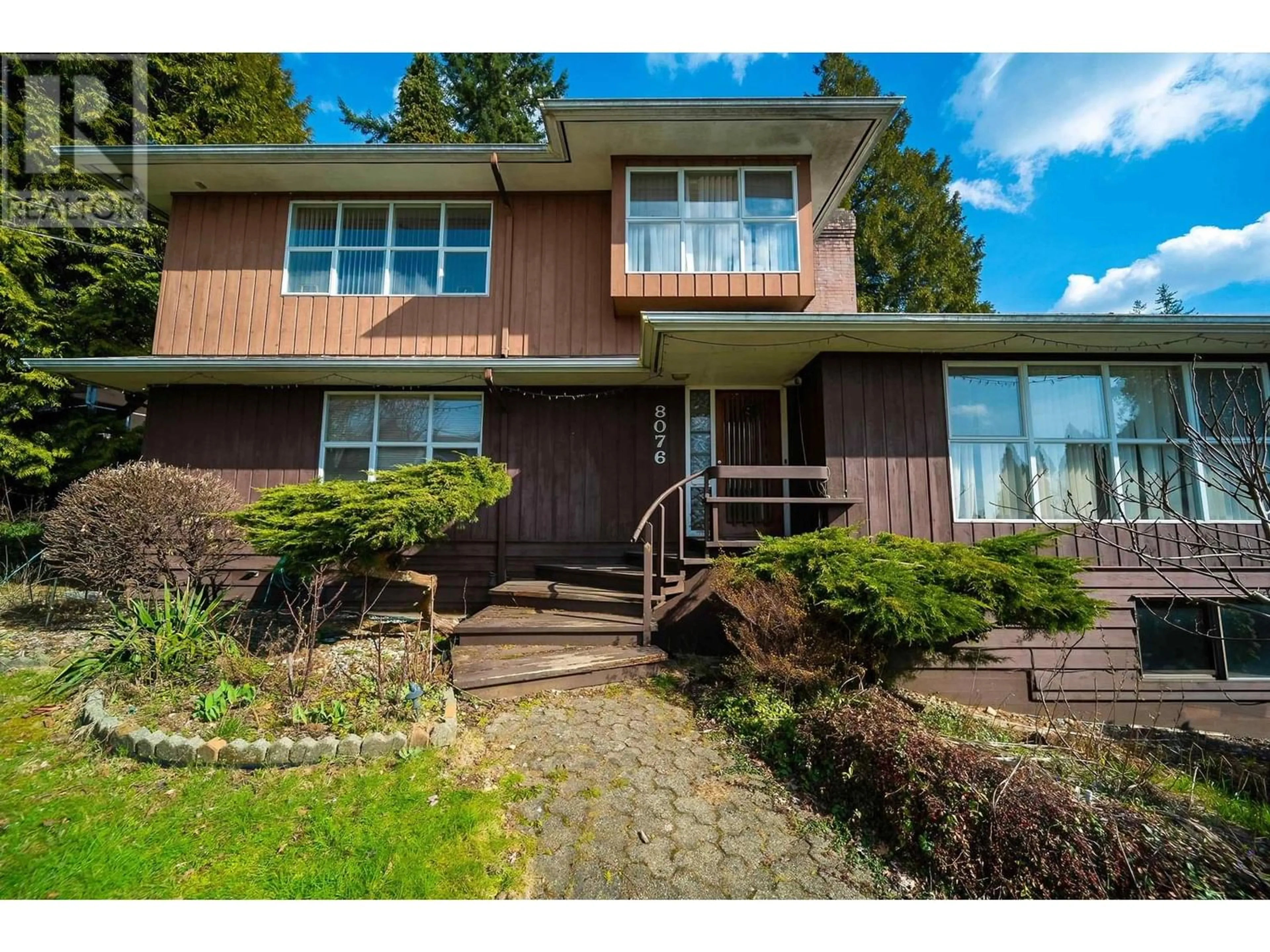Frontside or backside of a home for 8076 GRAY AVENUE, Burnaby British Columbia V5J4A1