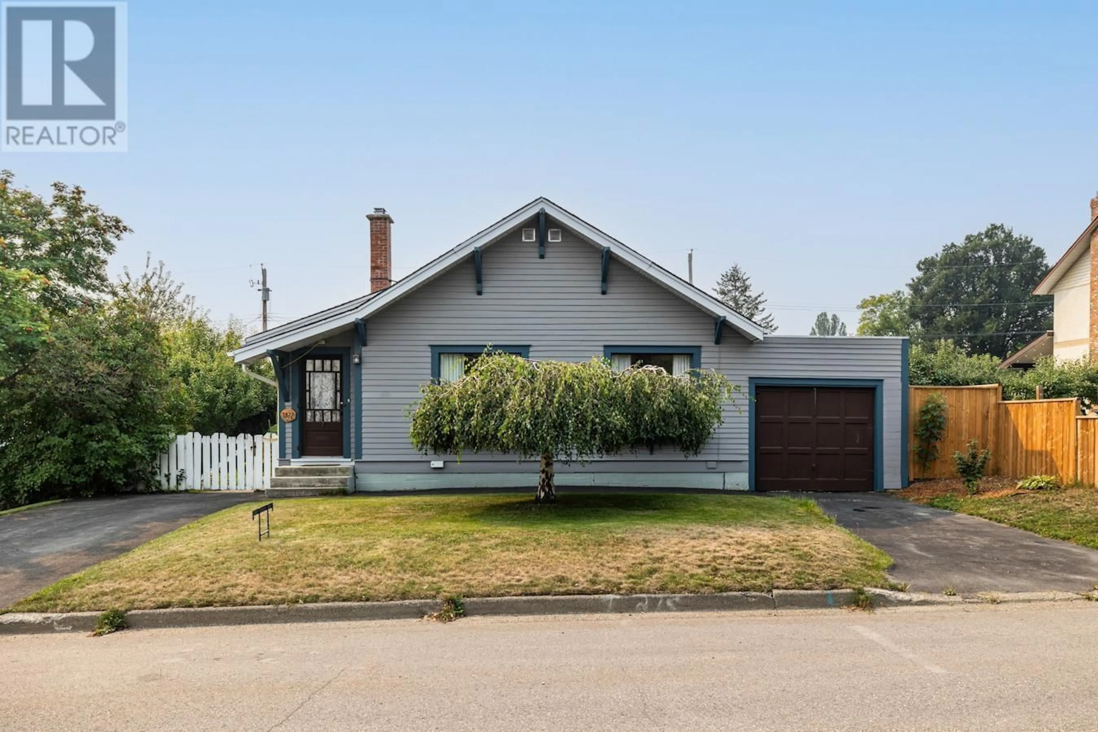 Frontside or backside of a home for 1877 10TH AVENUE, Prince George British Columbia V2M1N4