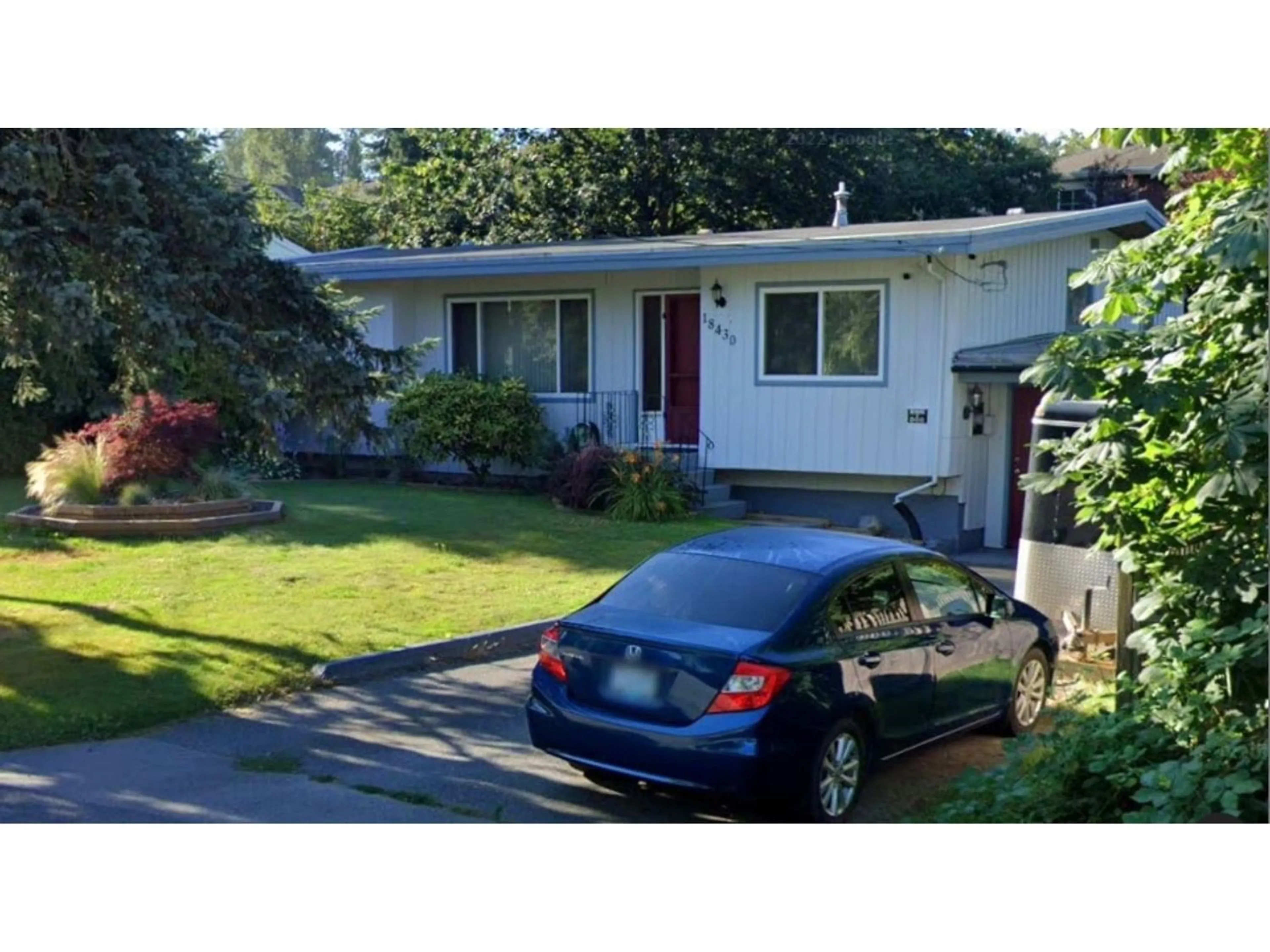 Home with vinyl exterior material, street for 18430 70 AVENUE, Surrey British Columbia V4N6B6