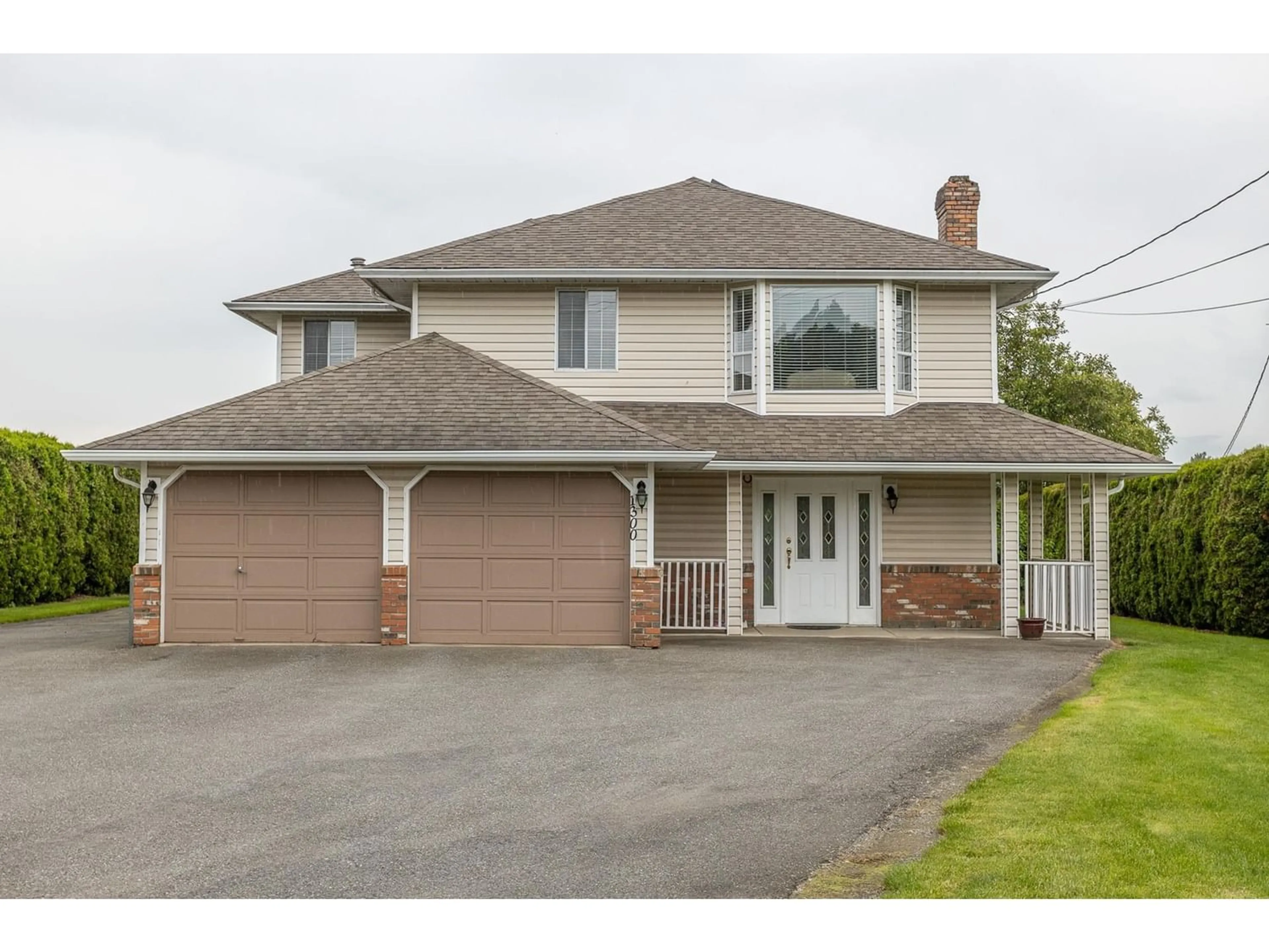 Frontside or backside of a home for 1300 GLADWIN ROAD, Abbotsford British Columbia V2T5Y3
