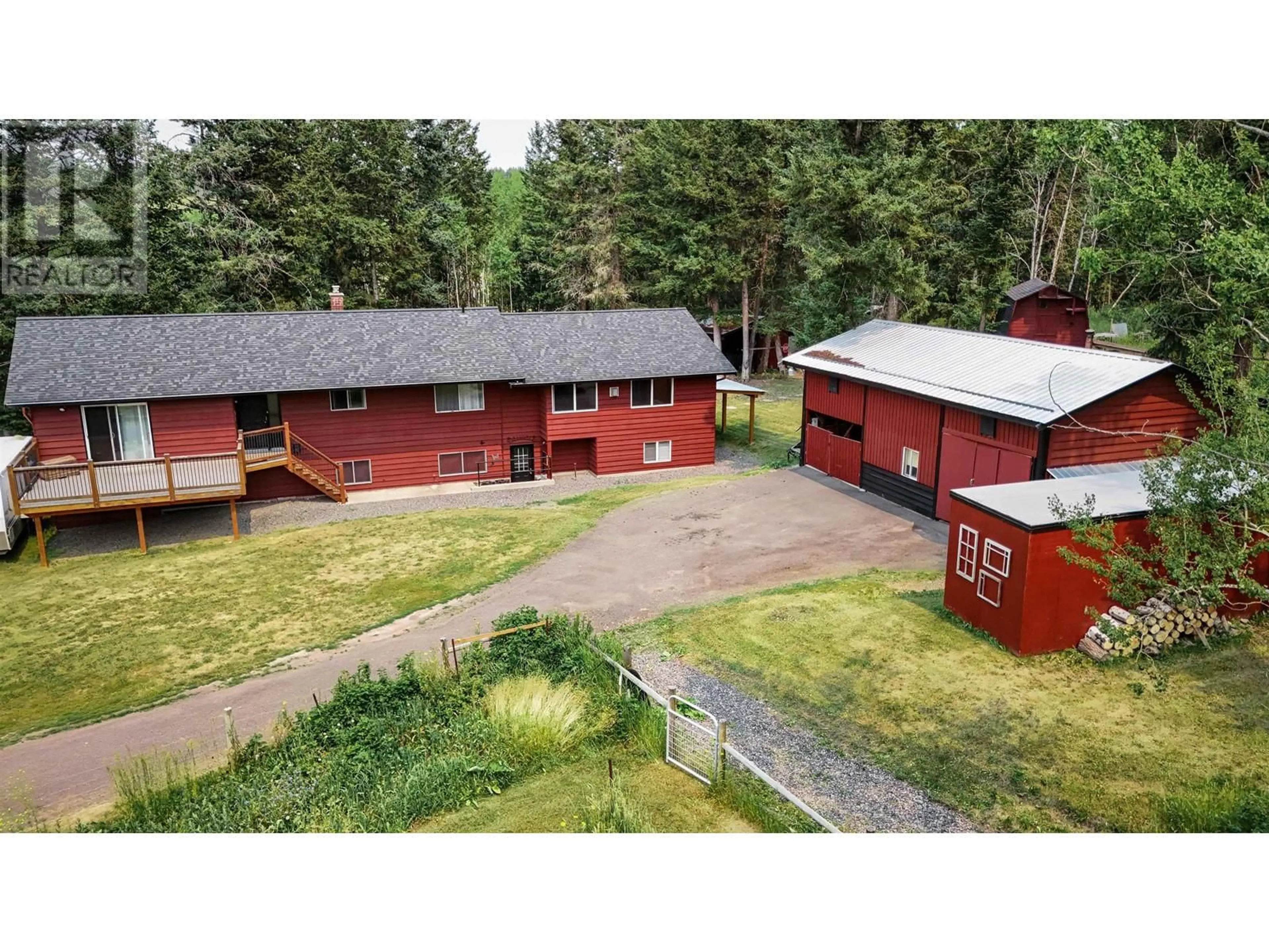 A pic from outside/outdoor area/front of a property/back of a property/a pic from drone, unknown for 4719 CARIBOO DRIVE, 108 Mile Ranch British Columbia V0K2Z0