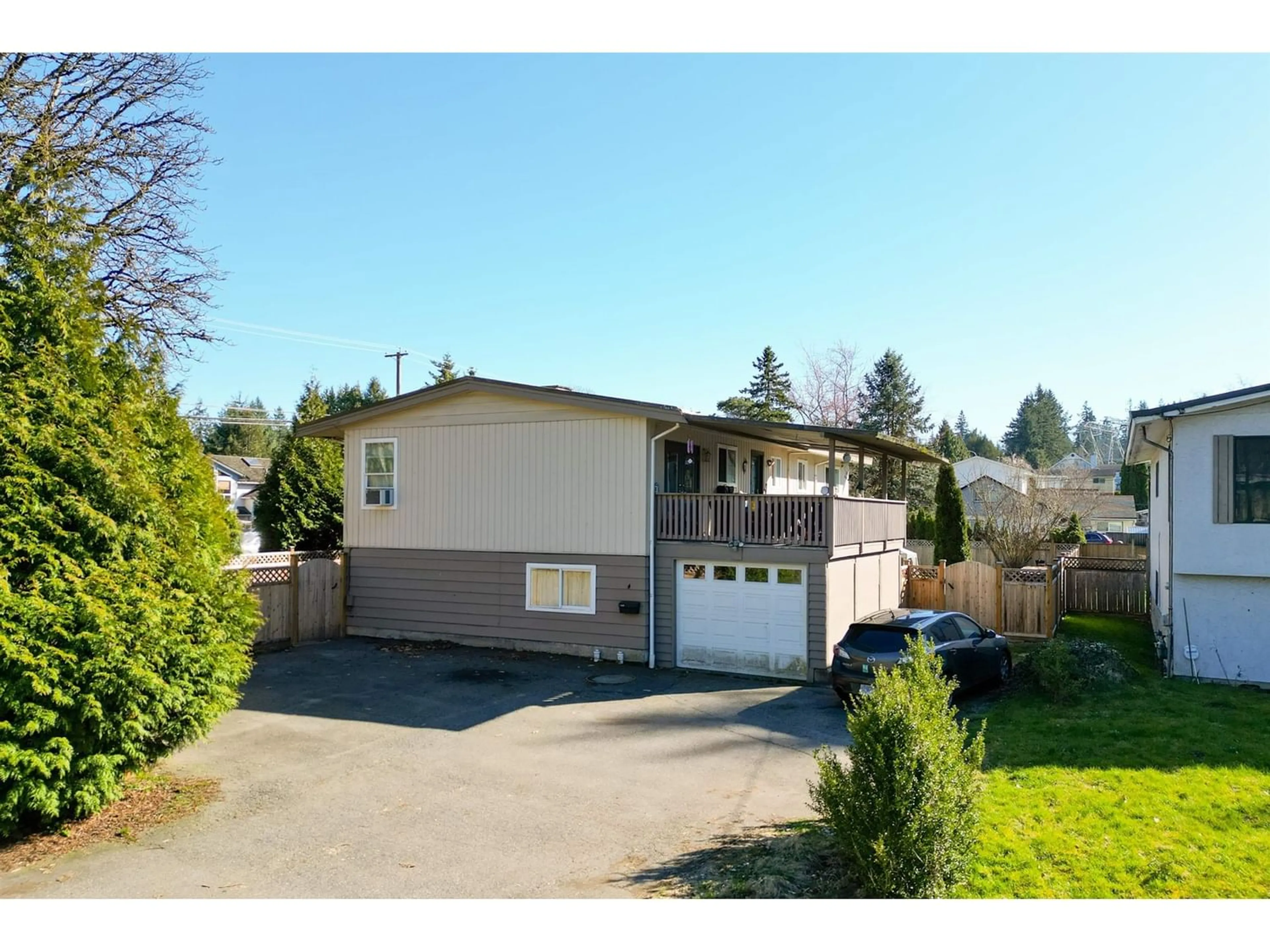 Frontside or backside of a home for 4887 200 STREET, Langley British Columbia V3A1L6