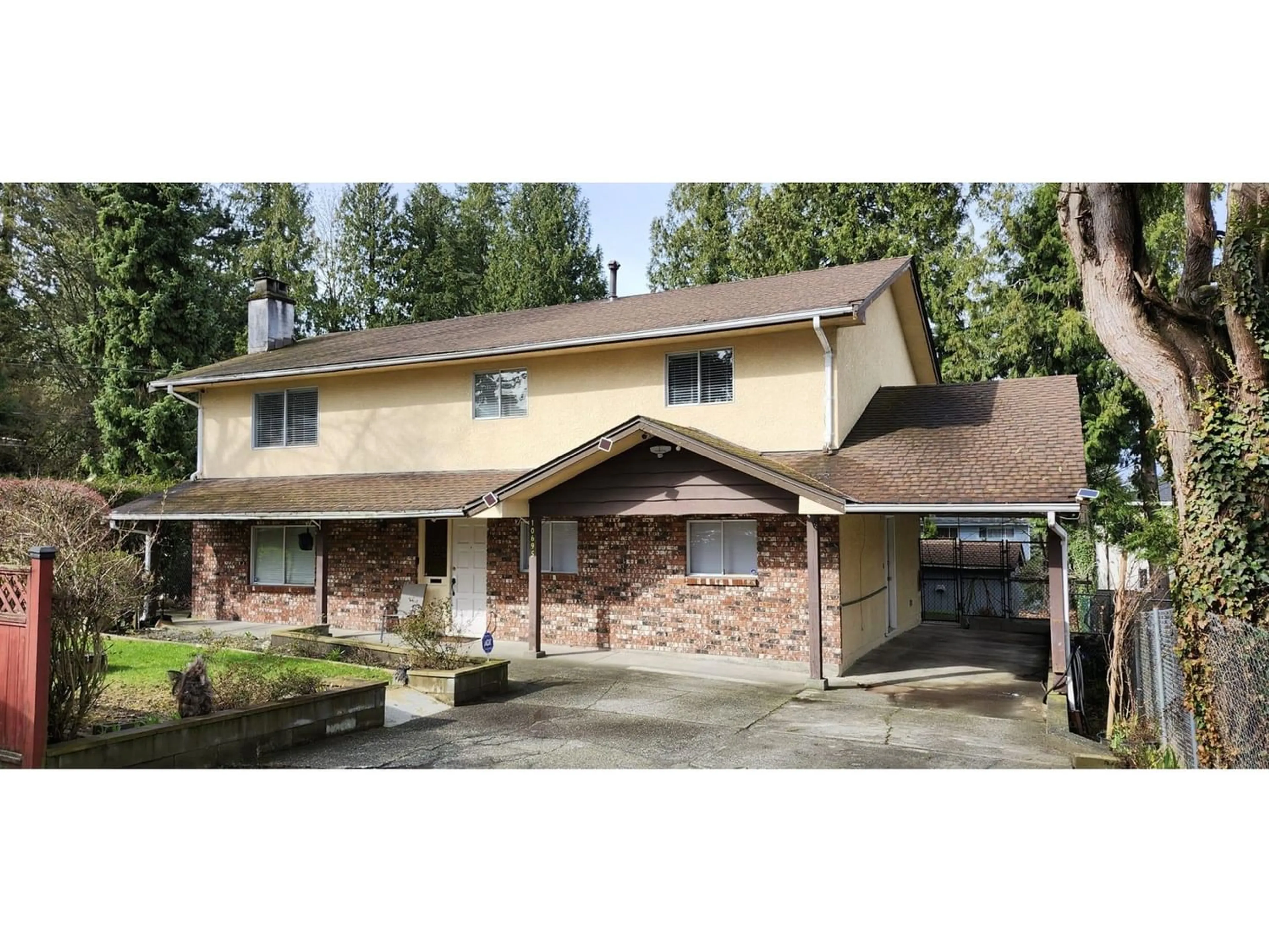 Frontside or backside of a home for 10695 128 STREET, Surrey British Columbia V3T2Z9