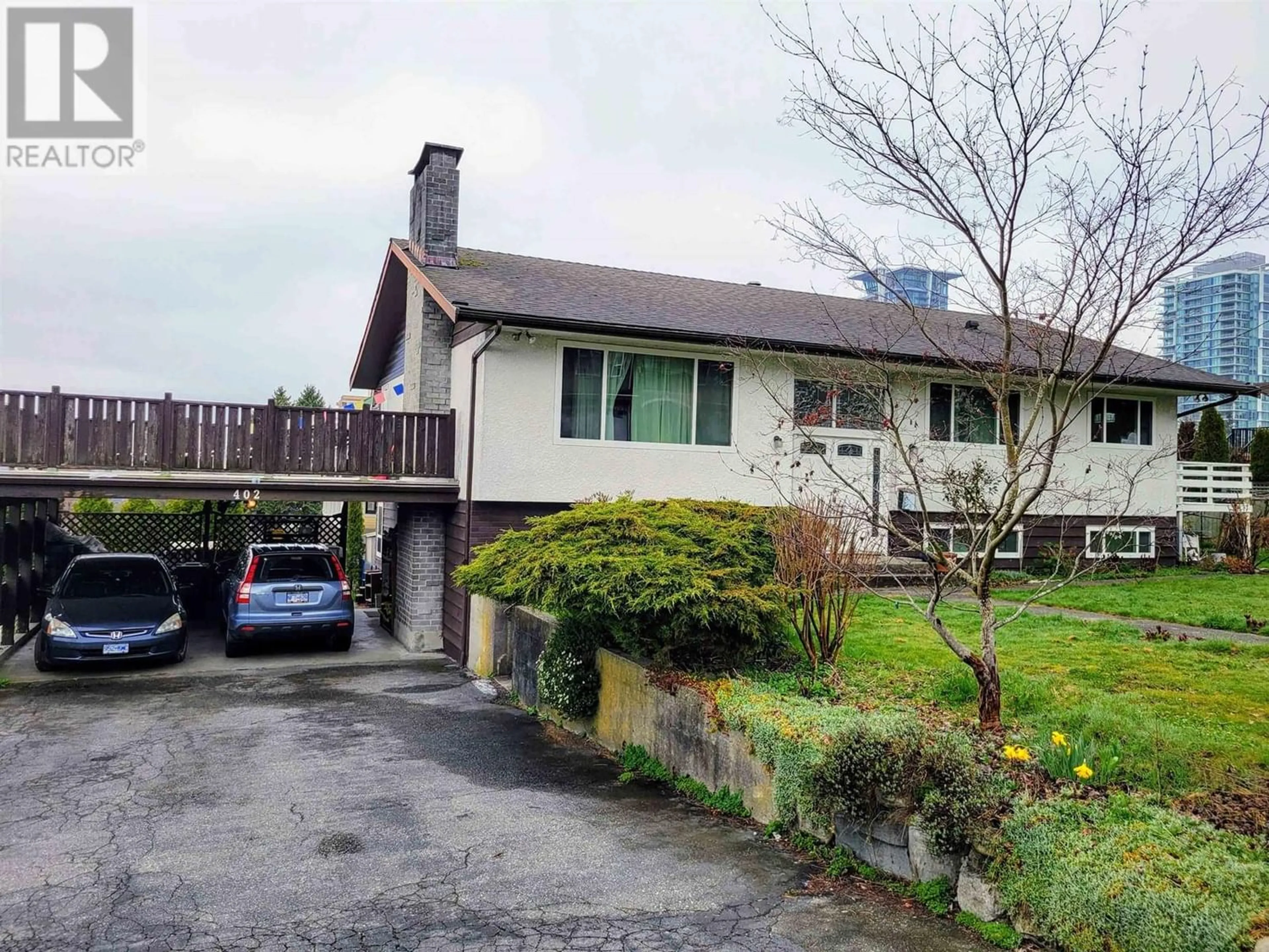 Frontside or backside of a home for 402 GUILBY STREET, Coquitlam British Columbia V3K3Y7