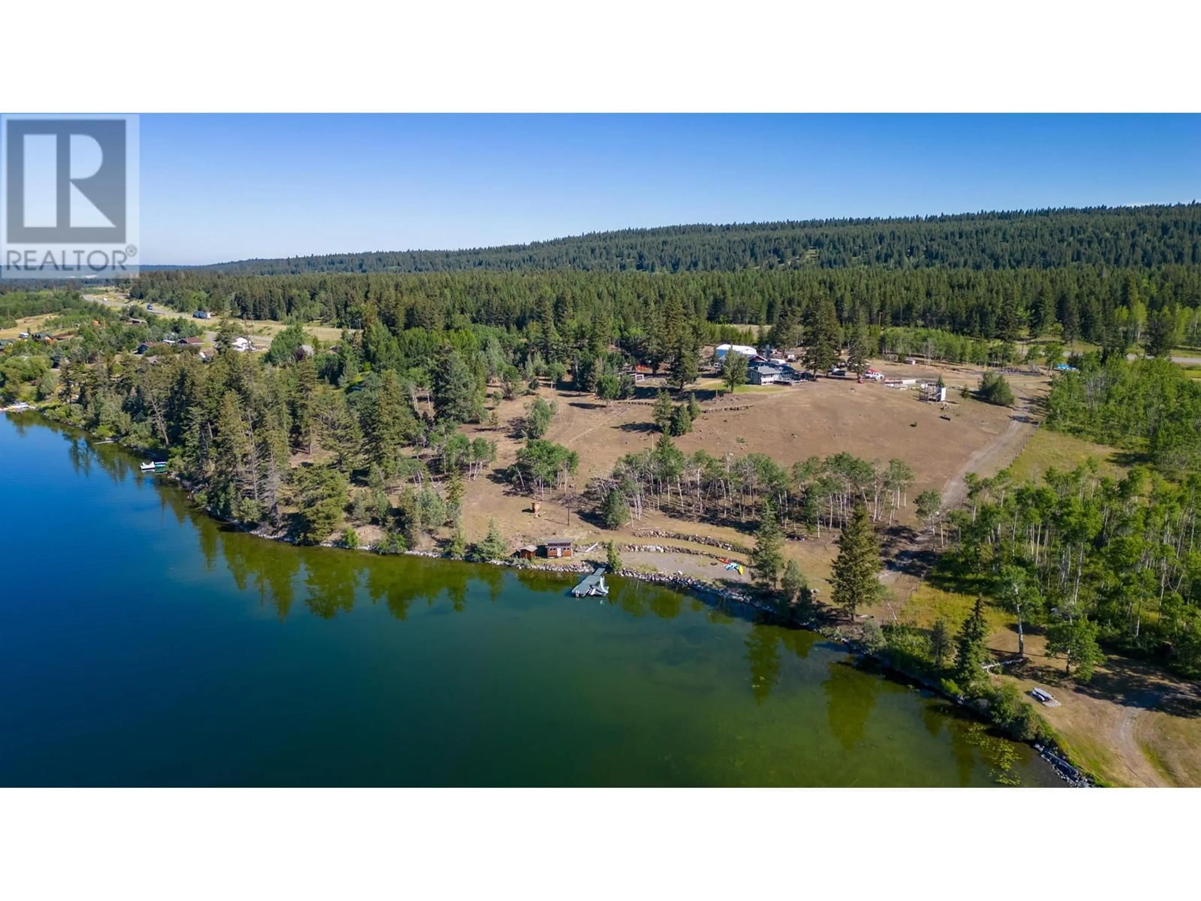 A pic from outside/outdoor area/front of a property/back of a property/a pic from drone, water/lake/river/ocean view for 3920 TROUT DRIVE, Lac La Hache British Columbia V0K1T0