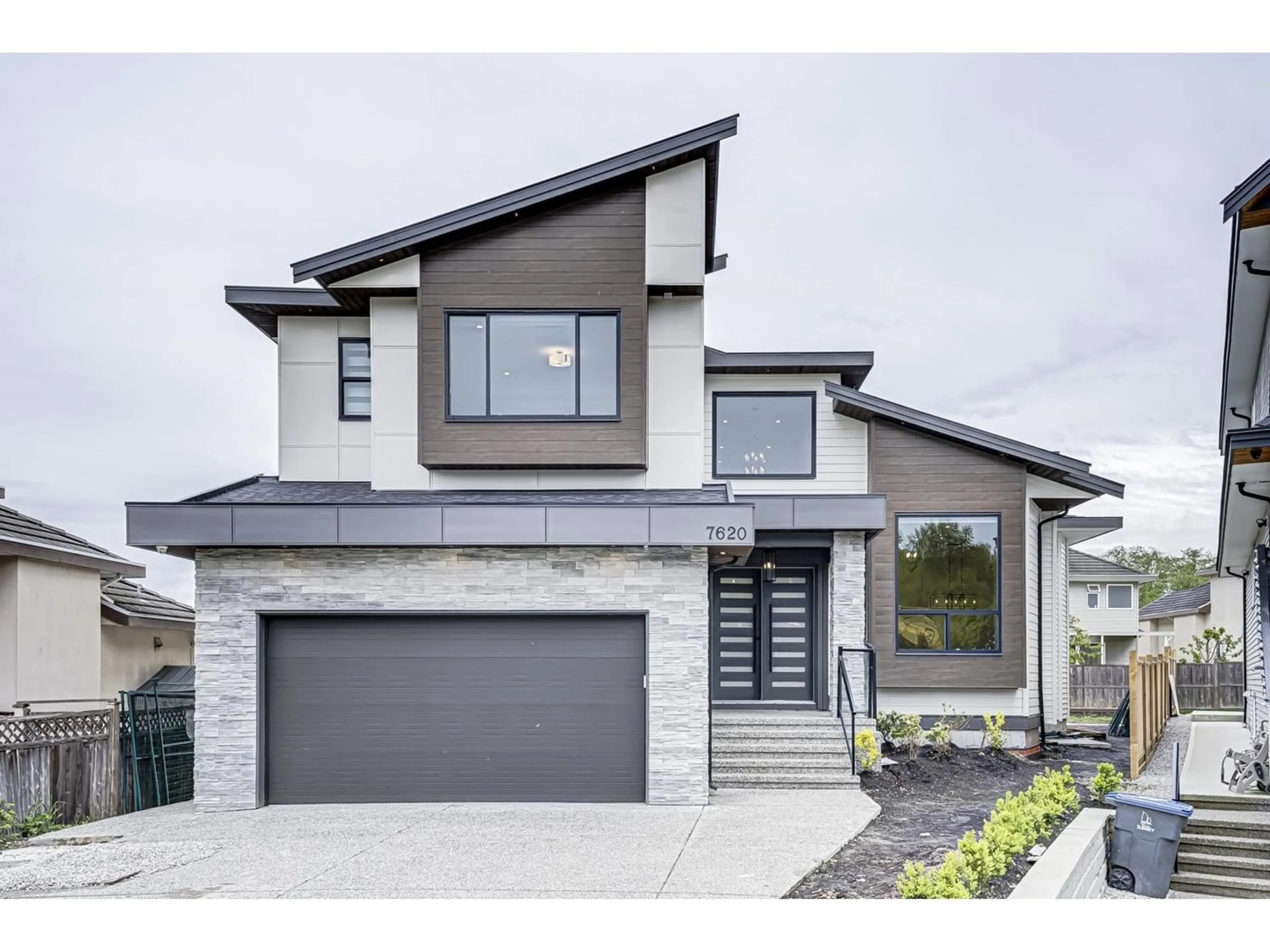 Frontside or backside of a home for 7620 144A STREET, Surrey British Columbia V3S9K8