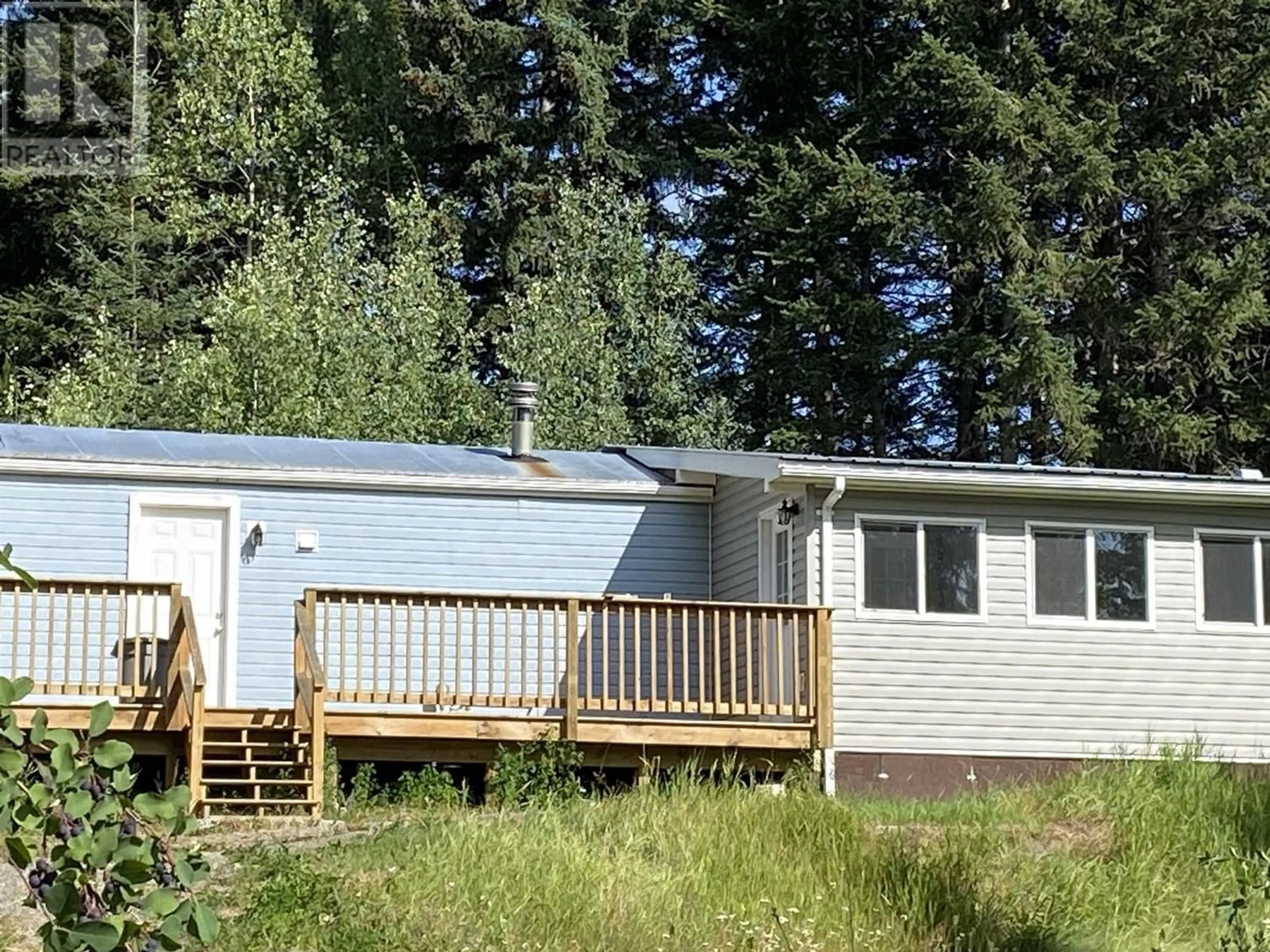 Frontside or backside of a home for 6446 LYNX ROAD, 100 Mile House British Columbia V0K1M0