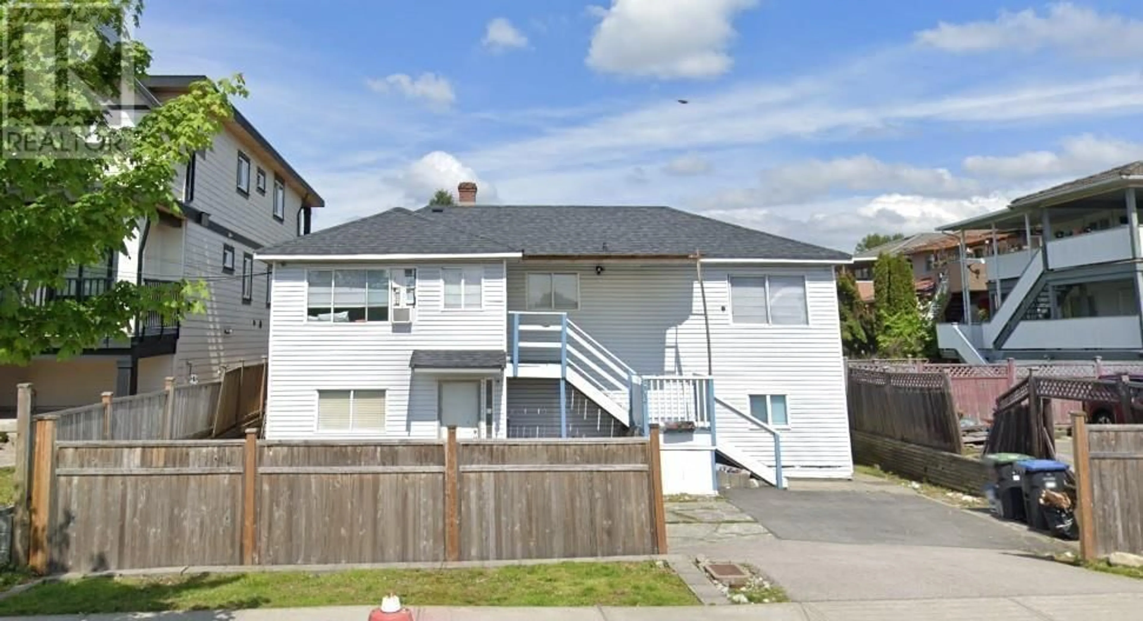 Frontside or backside of a home for 803 EWEN AVENUE, New Westminster British Columbia V3M5C6