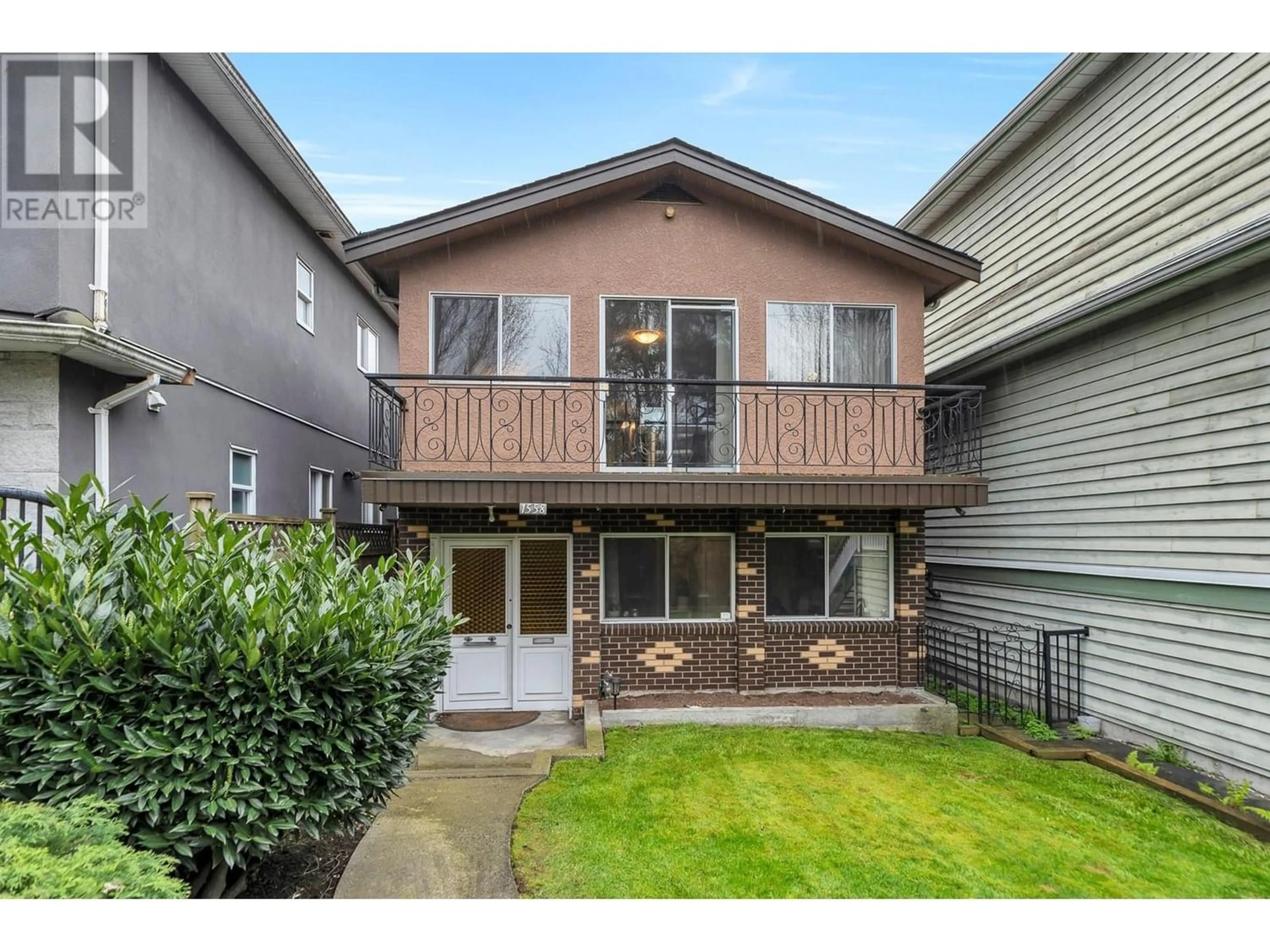 Frontside or backside of a home for 1558 E 2ND AVENUE, Vancouver British Columbia V5N1C7