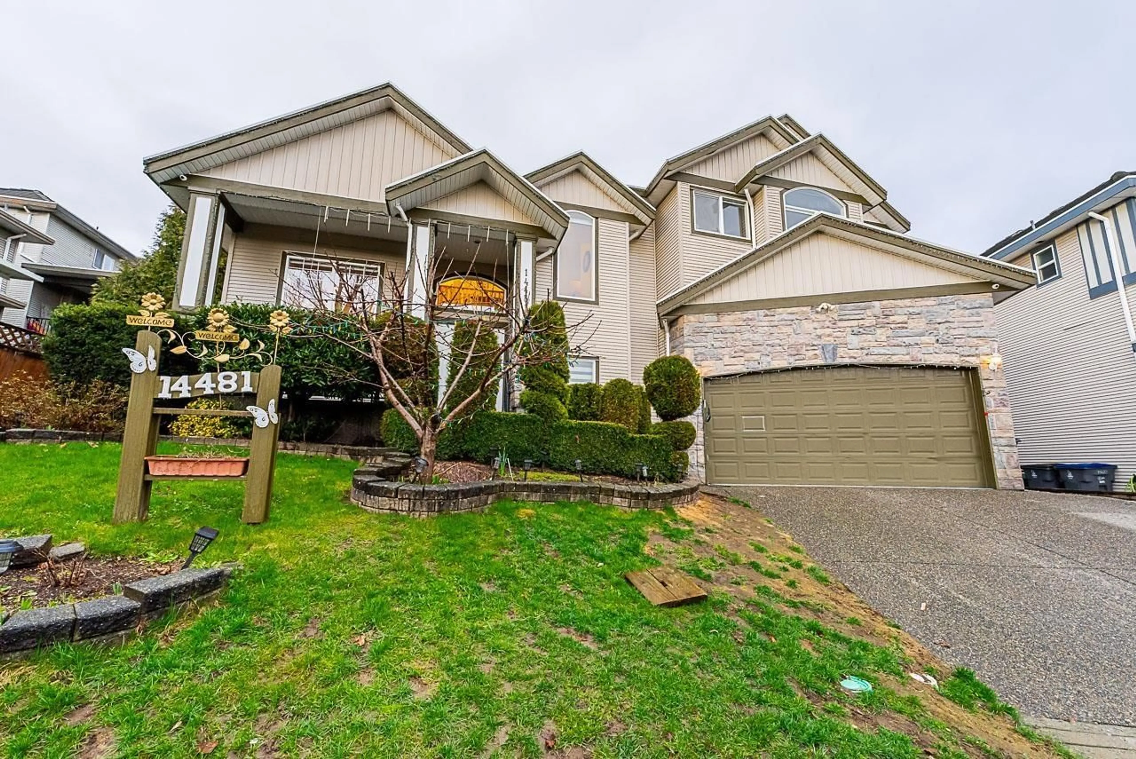 Frontside or backside of a home for 14481 67B AVENUE, Surrey British Columbia V3S0T3