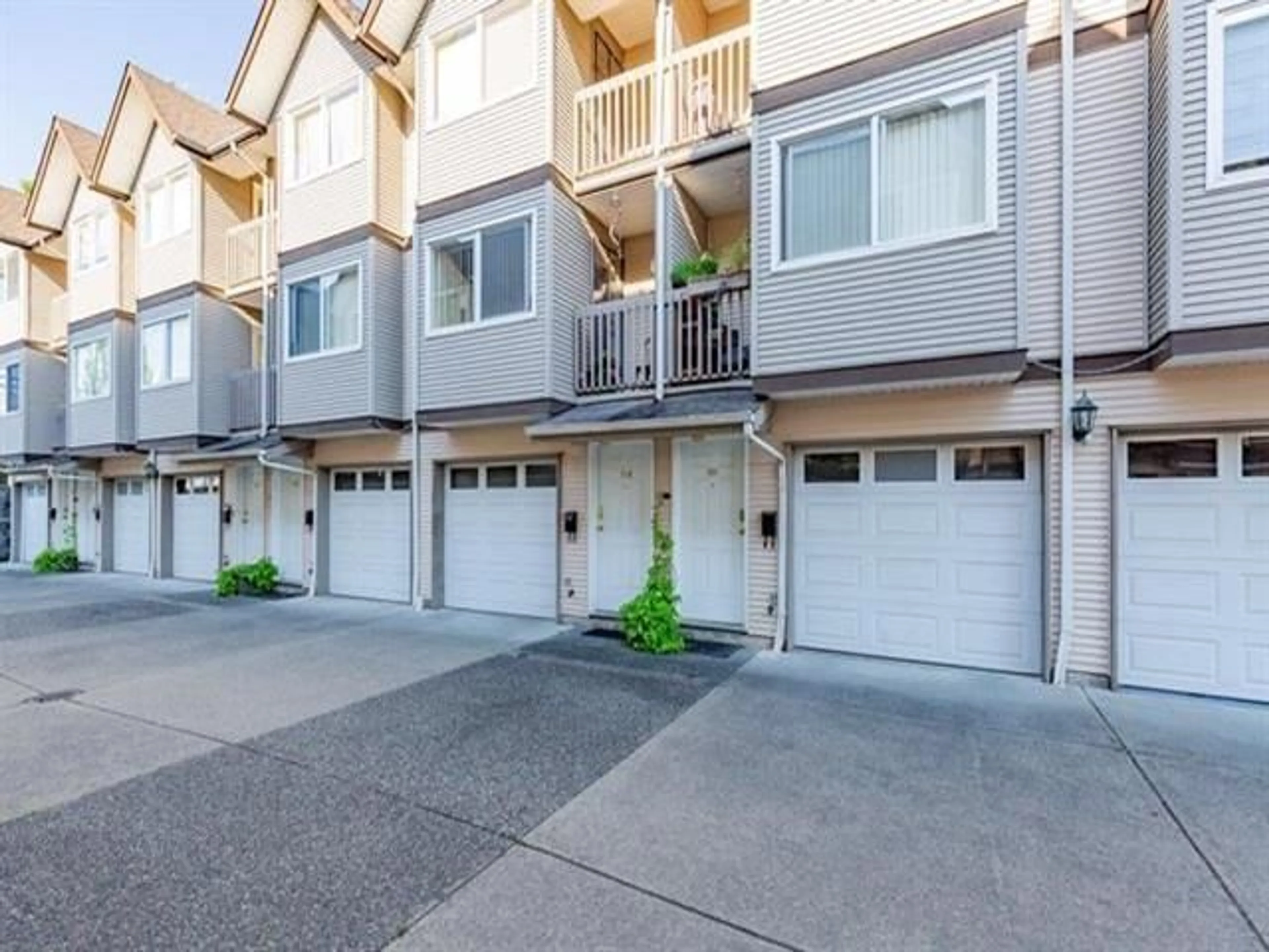 A pic from exterior of the house or condo for 112 19700 56 AVENUE, Langley British Columbia V3A3X6