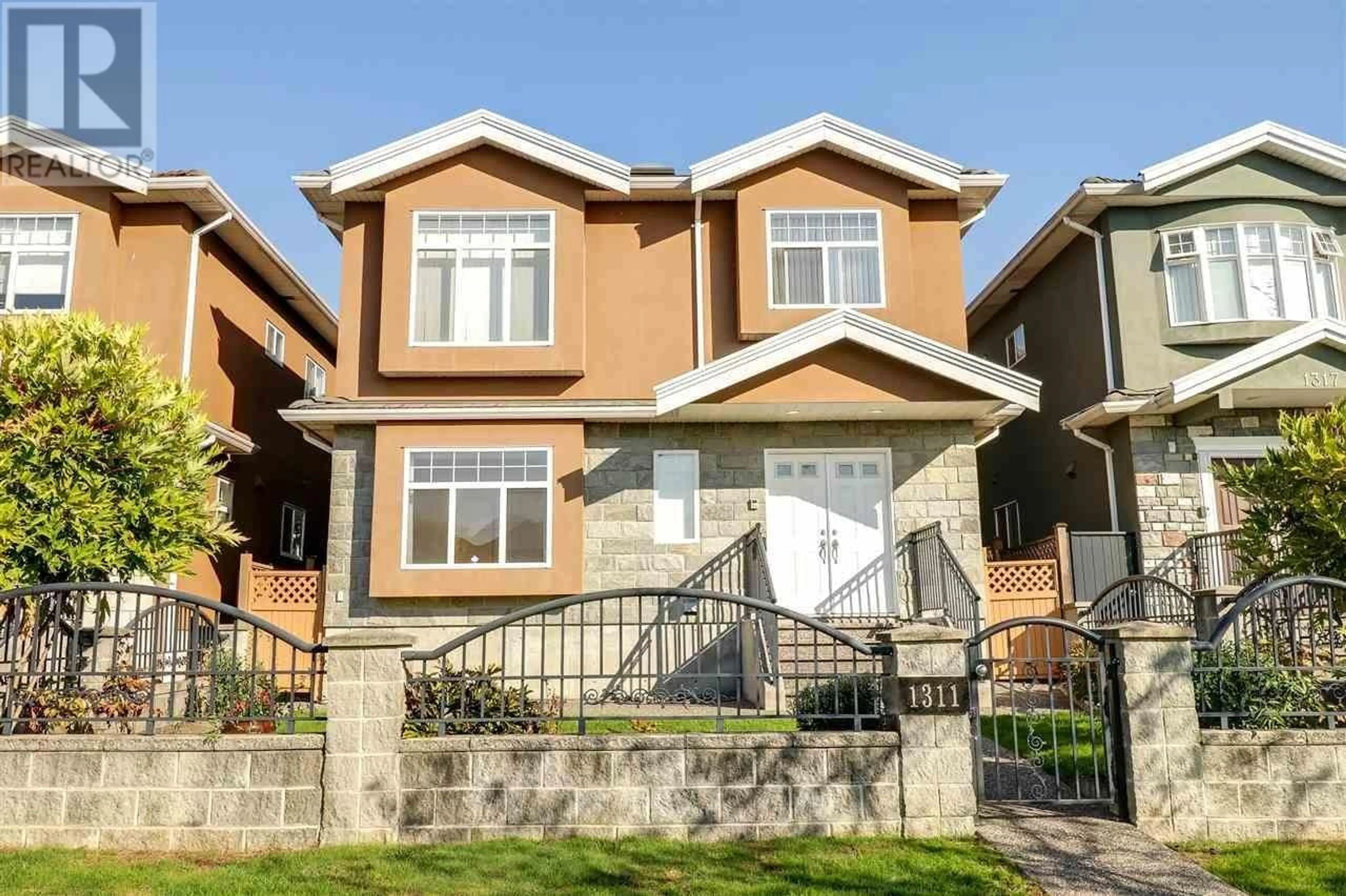 Frontside or backside of a home for 1311 E 60TH AVENUE, Vancouver British Columbia V5X2A8