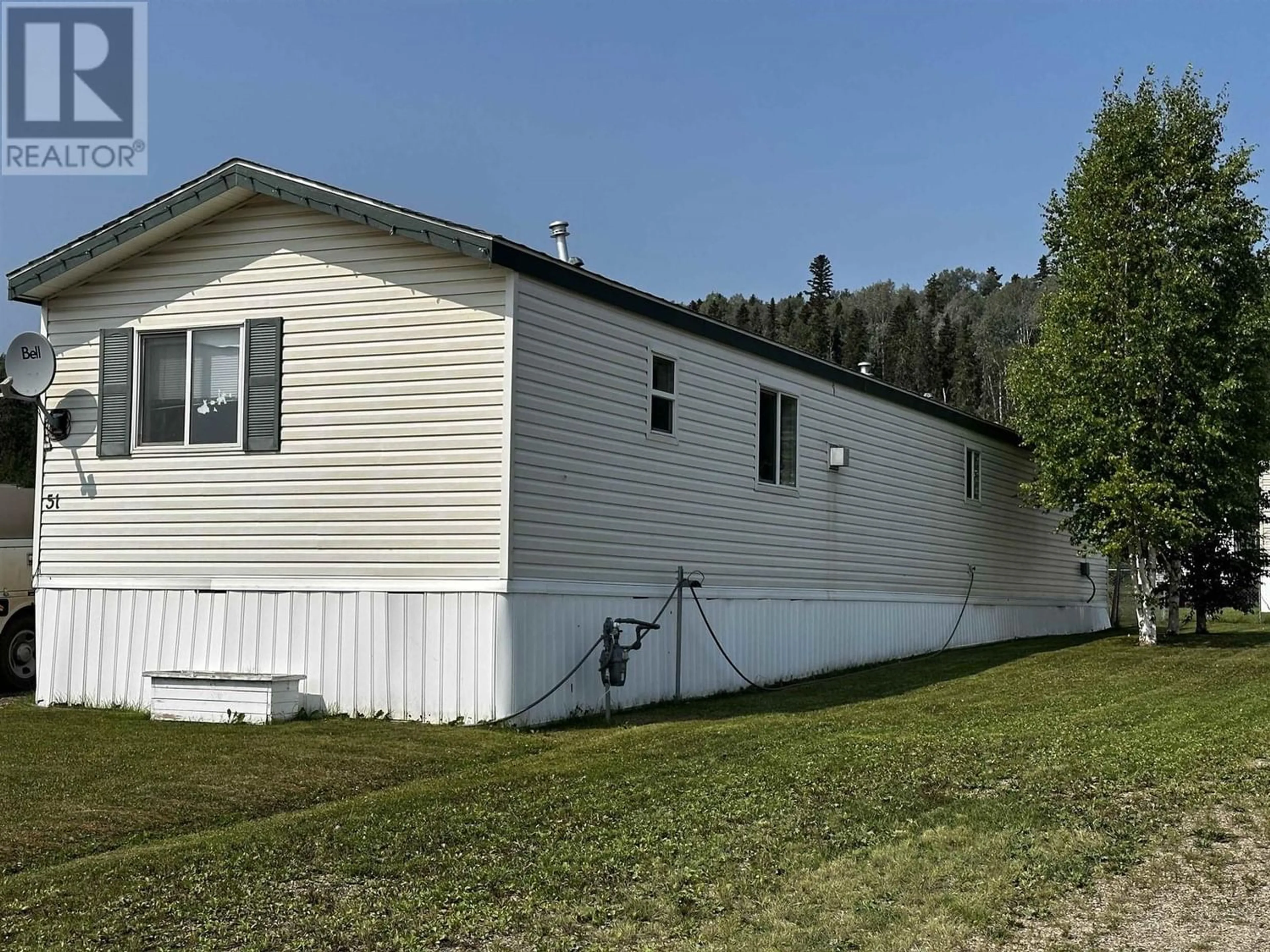 Frontside or backside of a home for 51 5701 AIRPORT DRIVE, Fort Nelson British Columbia V0C1R0