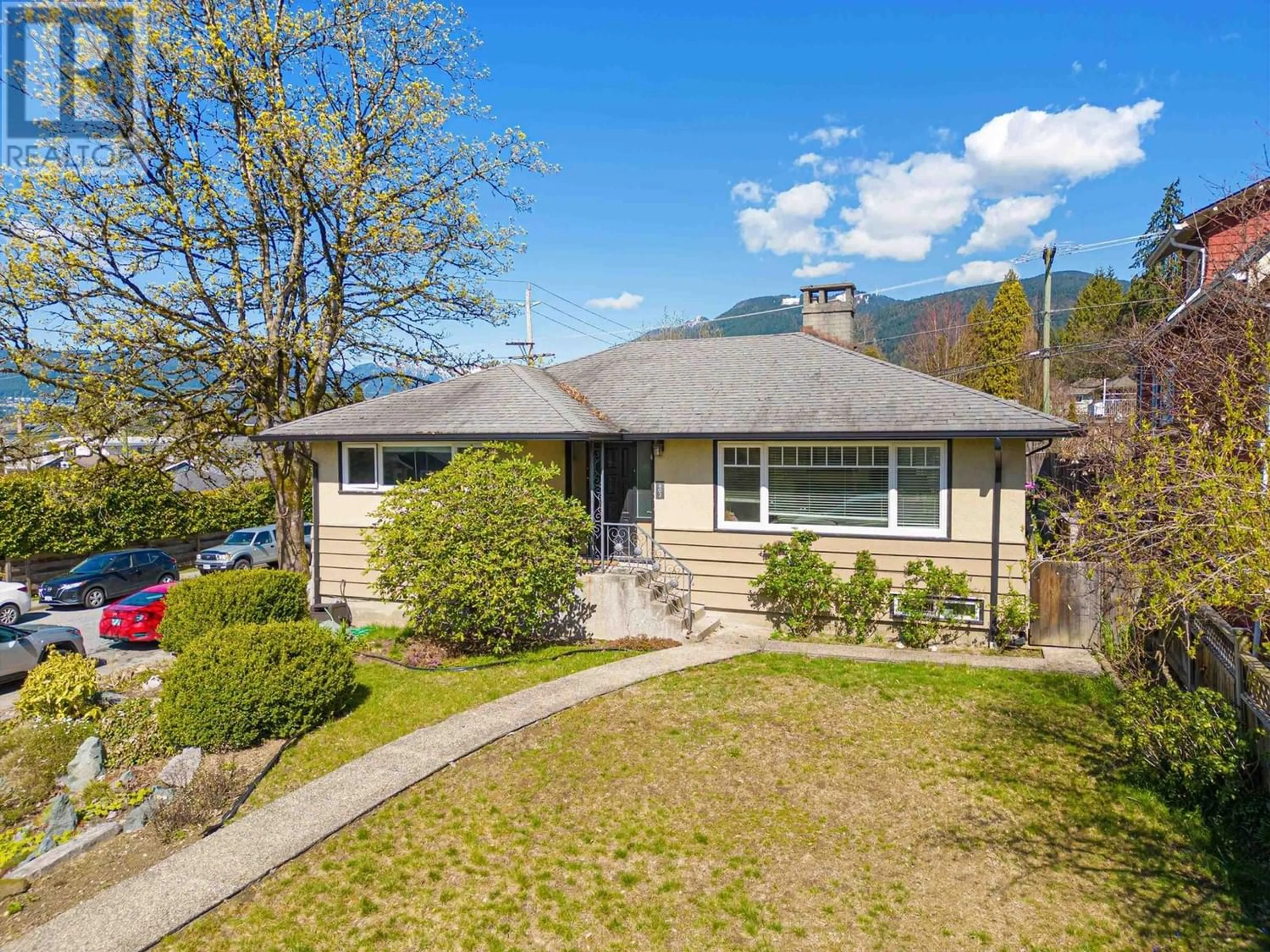 Frontside or backside of a home for 402 E 17TH STREET, North Vancouver British Columbia V7L2W2