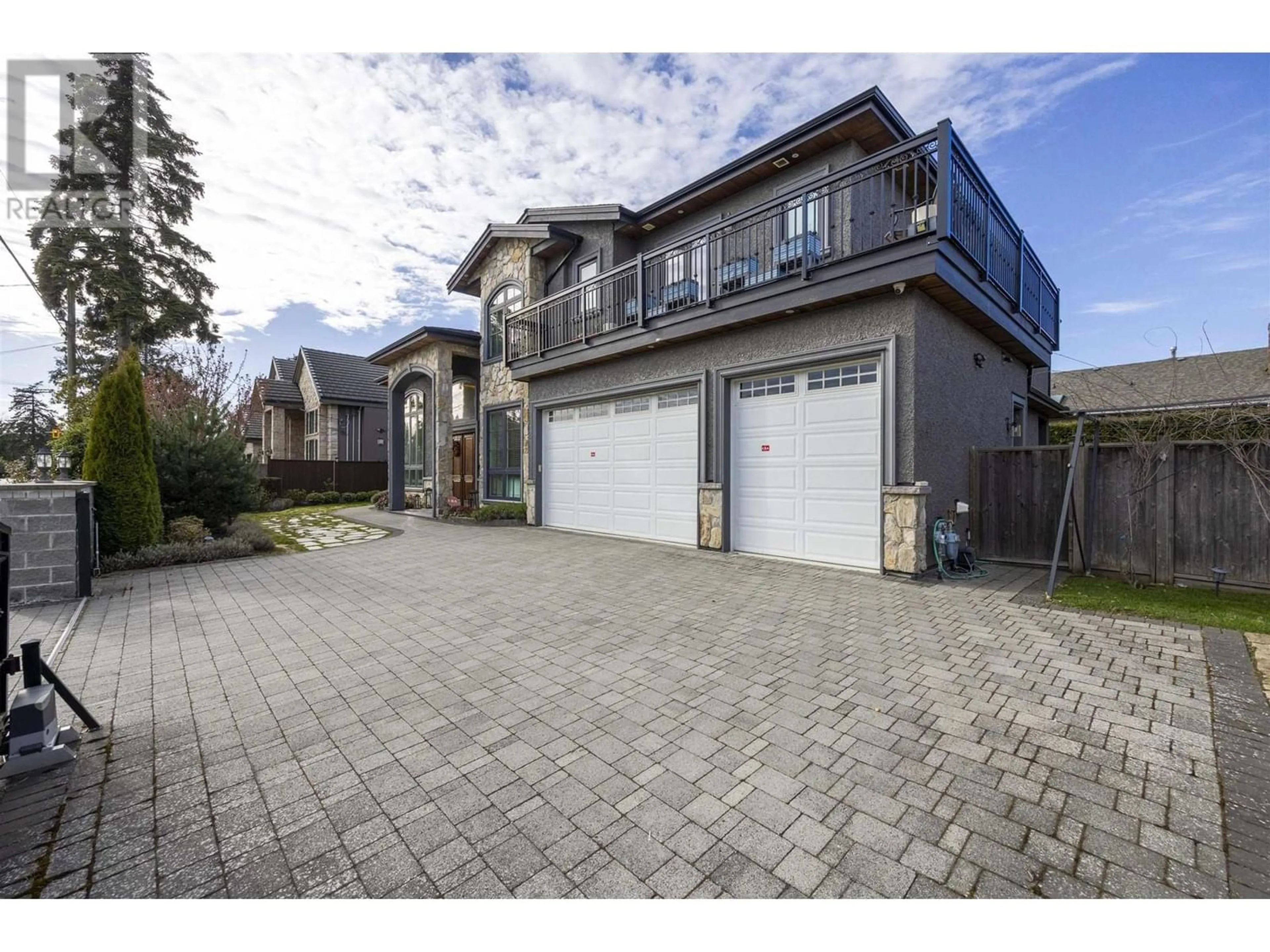 Frontside or backside of a home for 5071 BLUNDELL ROAD, Richmond British Columbia V7C1H3