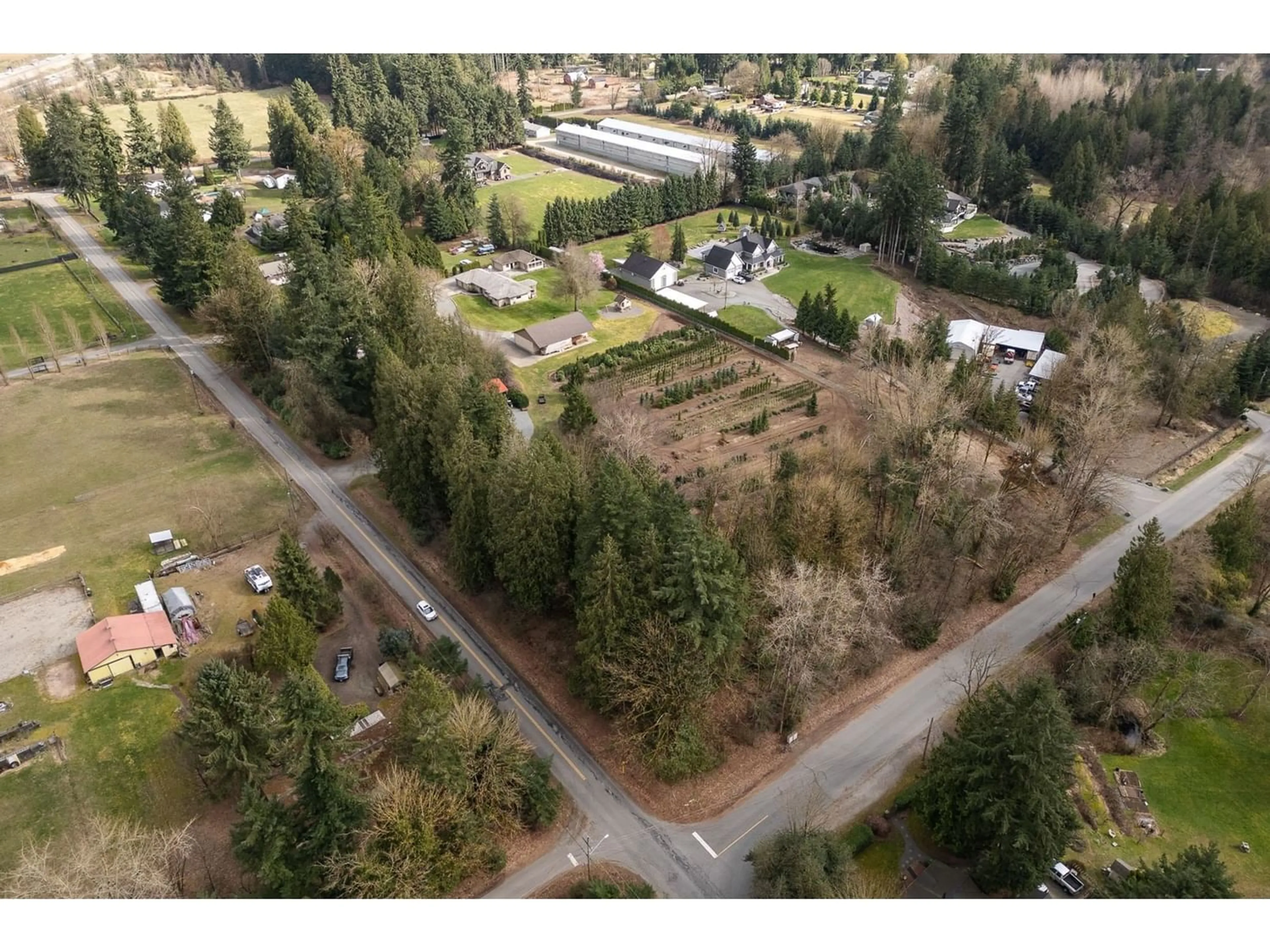 A pic from exterior of the house or condo, the fenced backyard for 23836 68 AVENUE, Langley British Columbia V2Y2H4