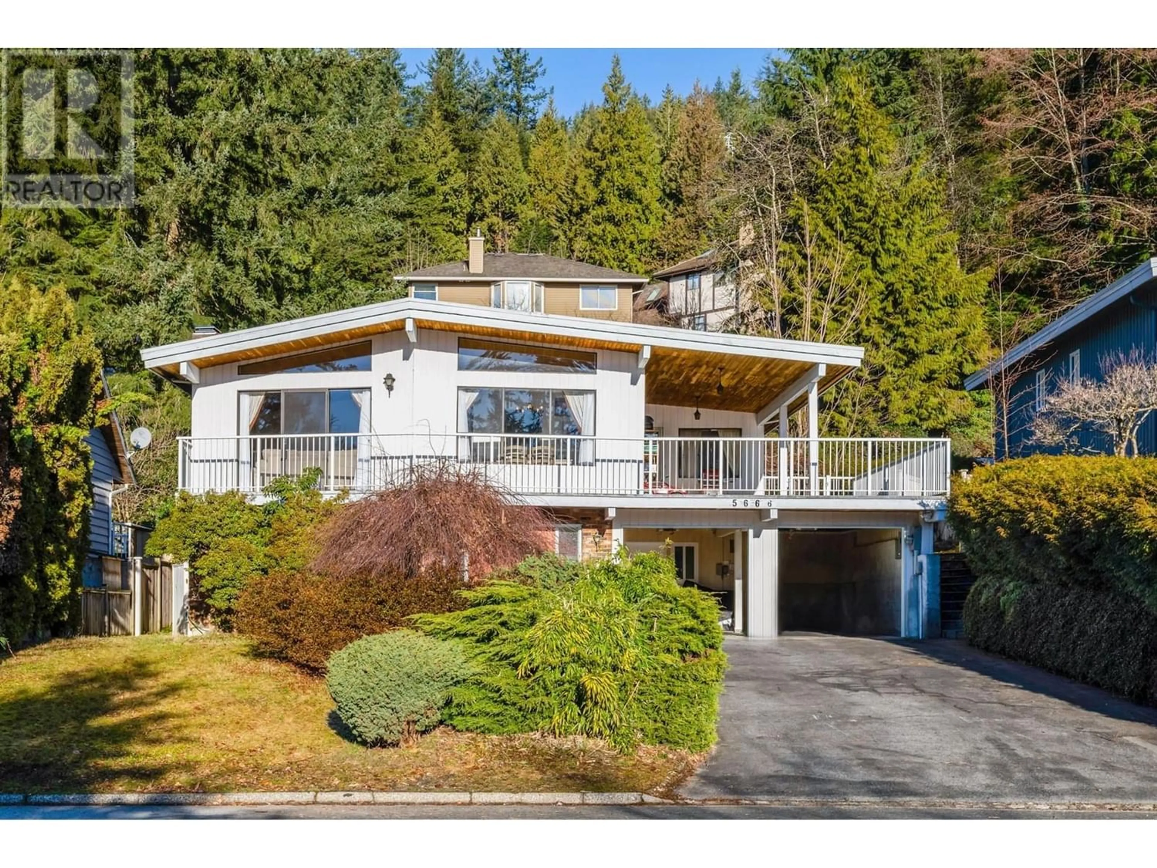 Frontside or backside of a home for 566 E BRAEMAR ROAD, North Vancouver British Columbia V7N1R3