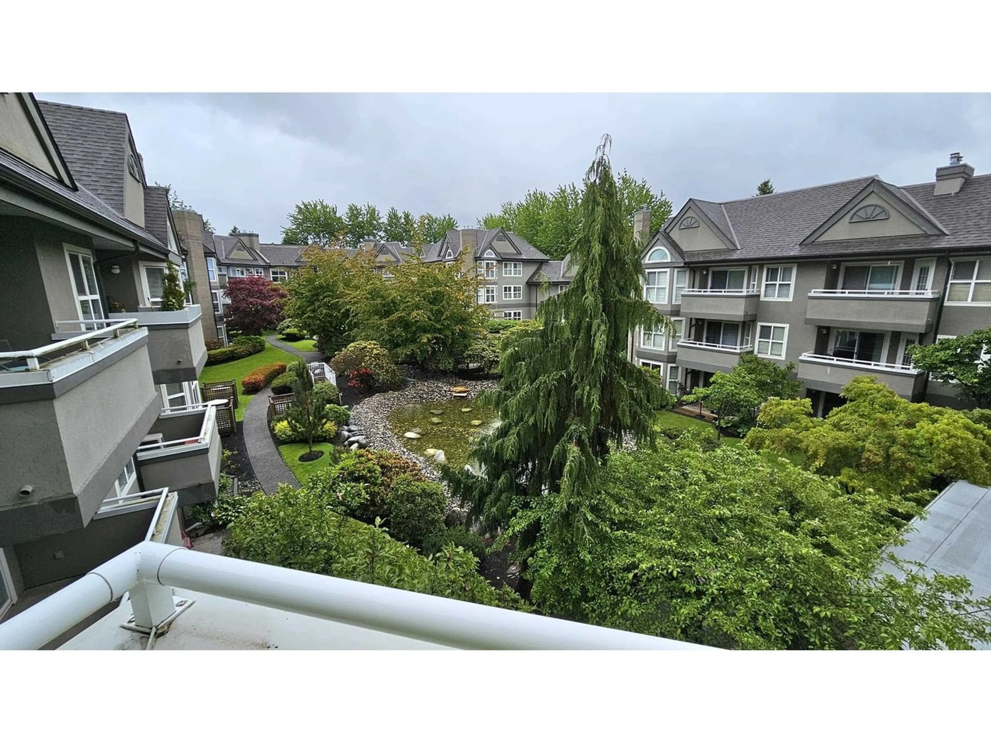 A pic from exterior of the house or condo, the street view for 308 6557 121 STREET, Surrey British Columbia V3W1E7