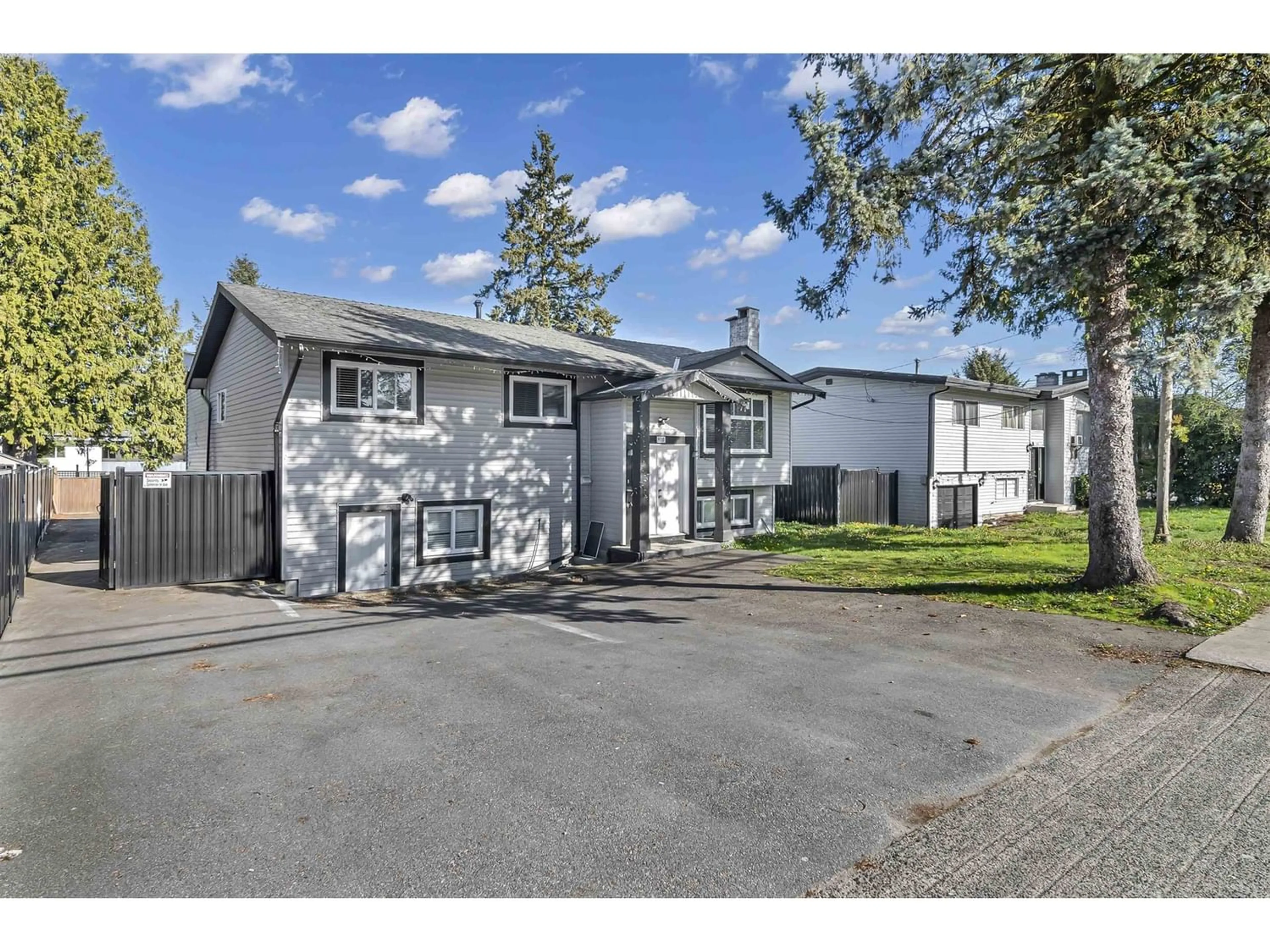 Frontside or backside of a home for 9110 128 STREET, Surrey British Columbia V3V5M8