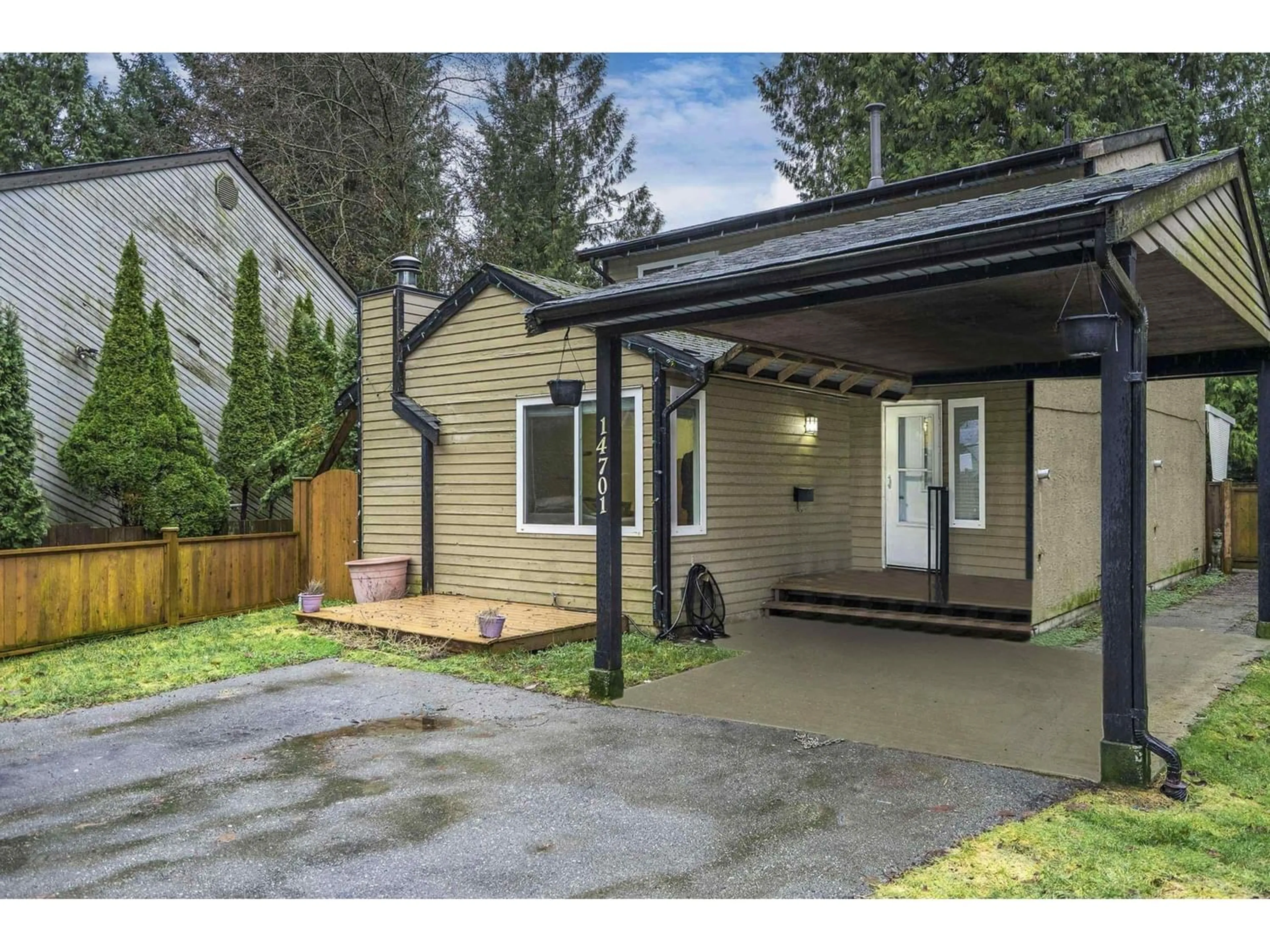 Frontside or backside of a home for 14701 101A AVENUE, Surrey British Columbia V3R7E3