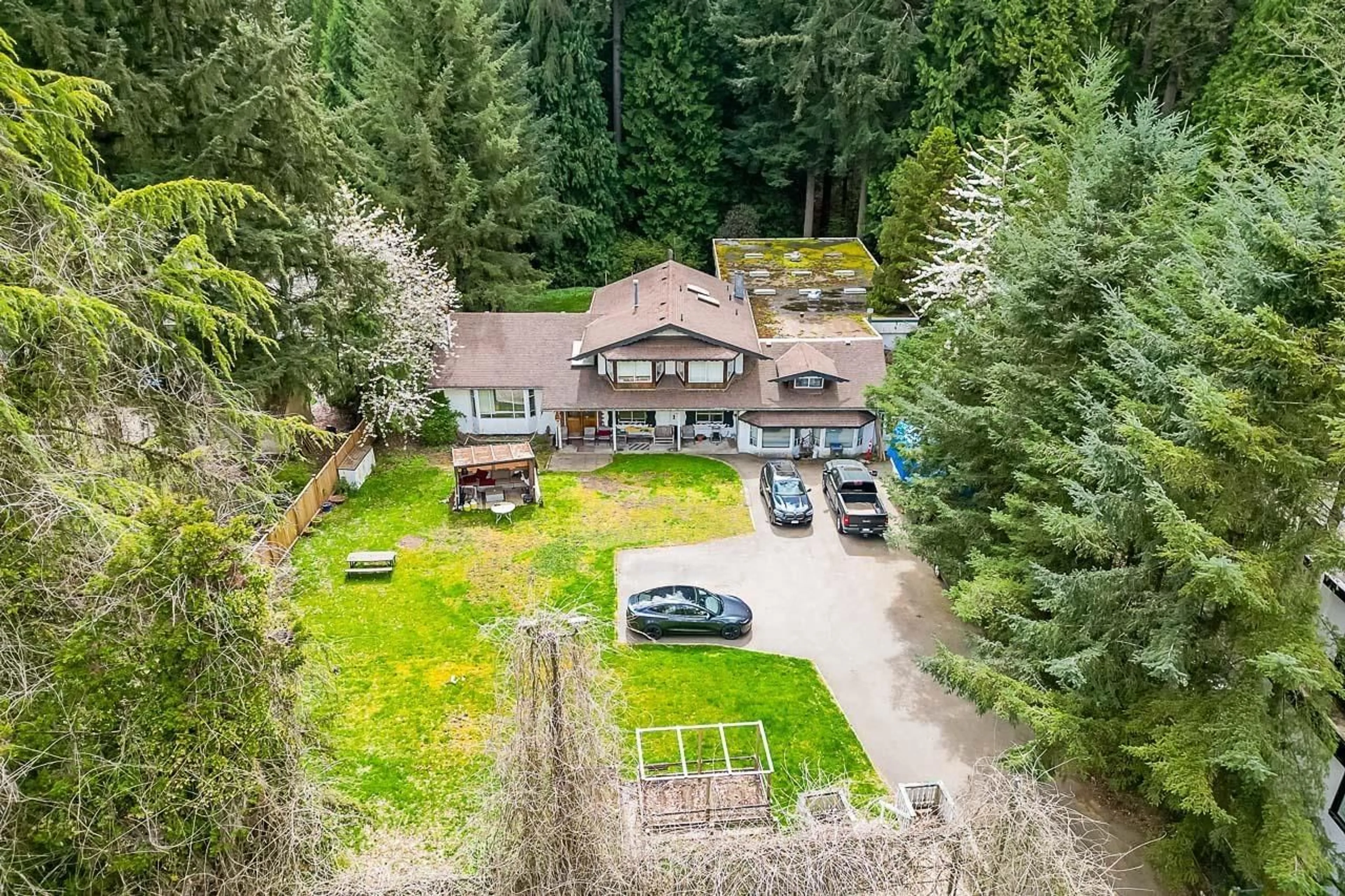 Frontside or backside of a home for 12428 55TH AVENUE, Surrey British Columbia V3X3B1