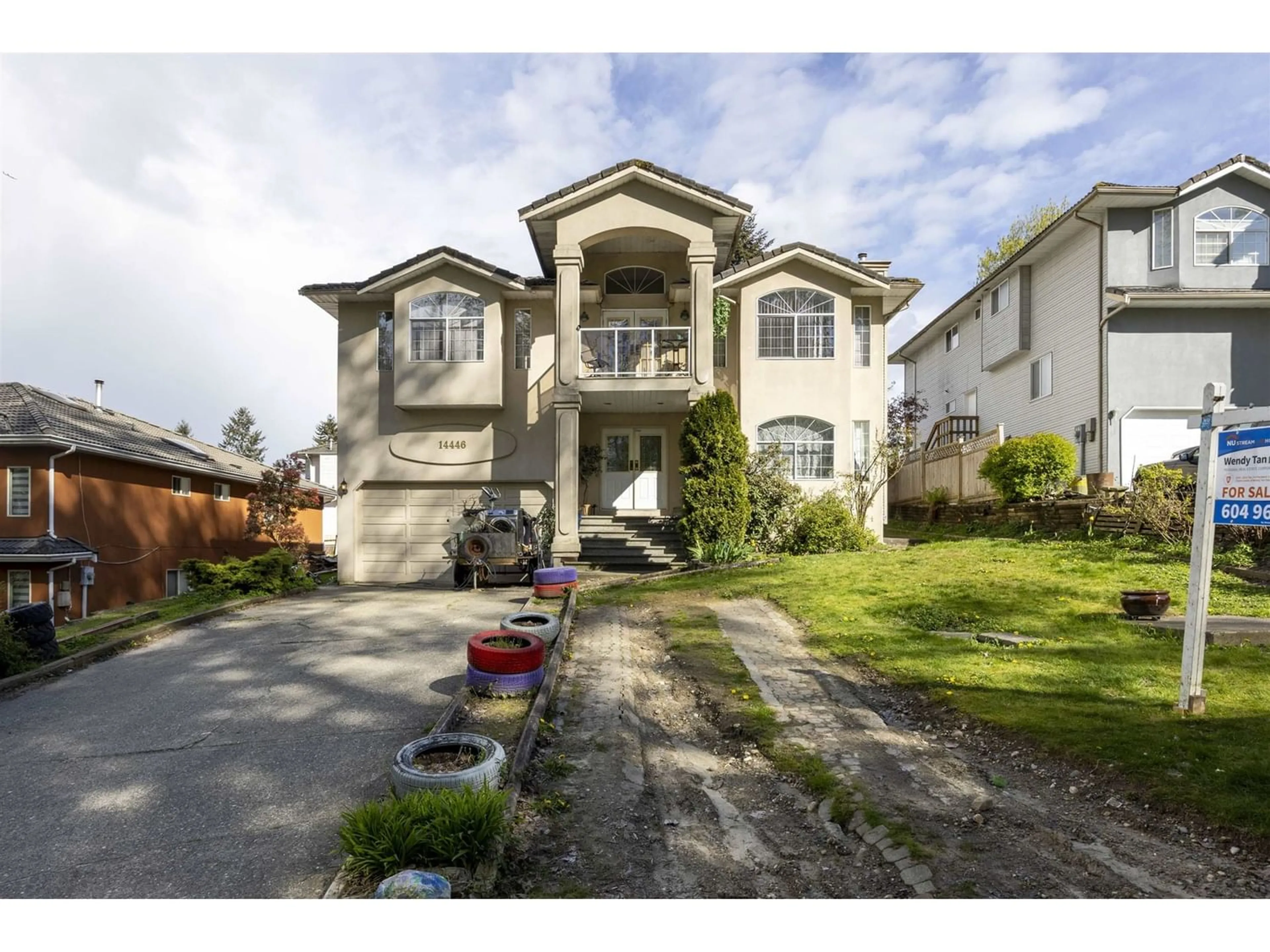 Frontside or backside of a home for 14446 BEDFORD DRIVE, Surrey British Columbia V3R0W3