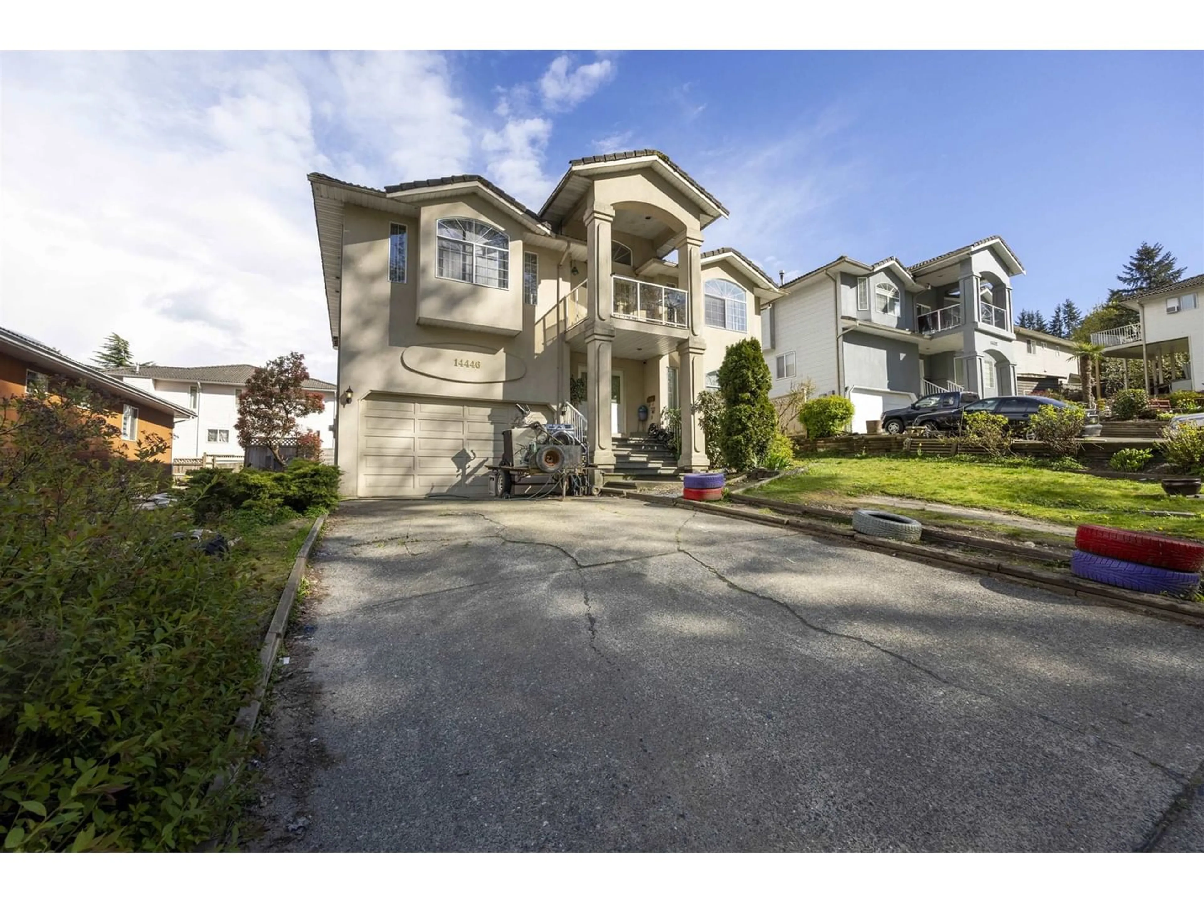 Frontside or backside of a home for 14446 BEDFORD DRIVE, Surrey British Columbia V3R0W3