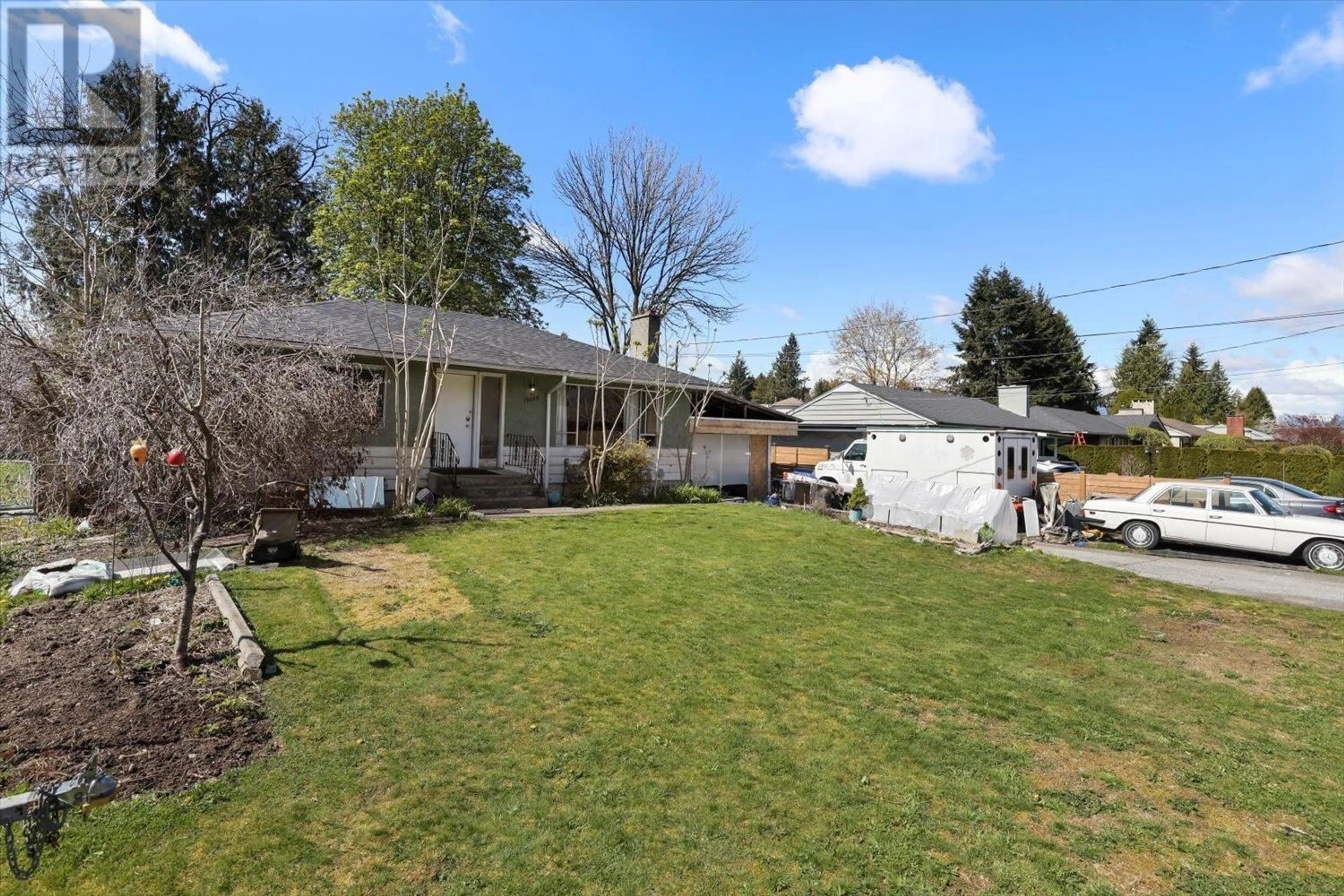 Frontside or backside of a home, the fenced backyard for 12039 220 STREET, Maple Ridge British Columbia V2X5R6