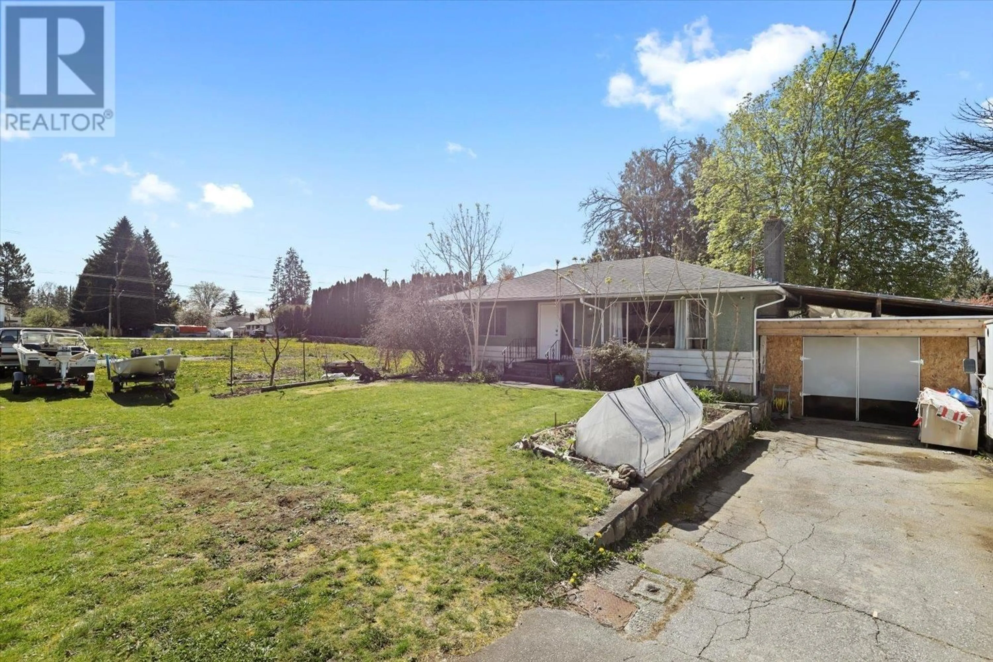 Frontside or backside of a home, the fenced backyard for 12039 220 STREET, Maple Ridge British Columbia V2X5R6