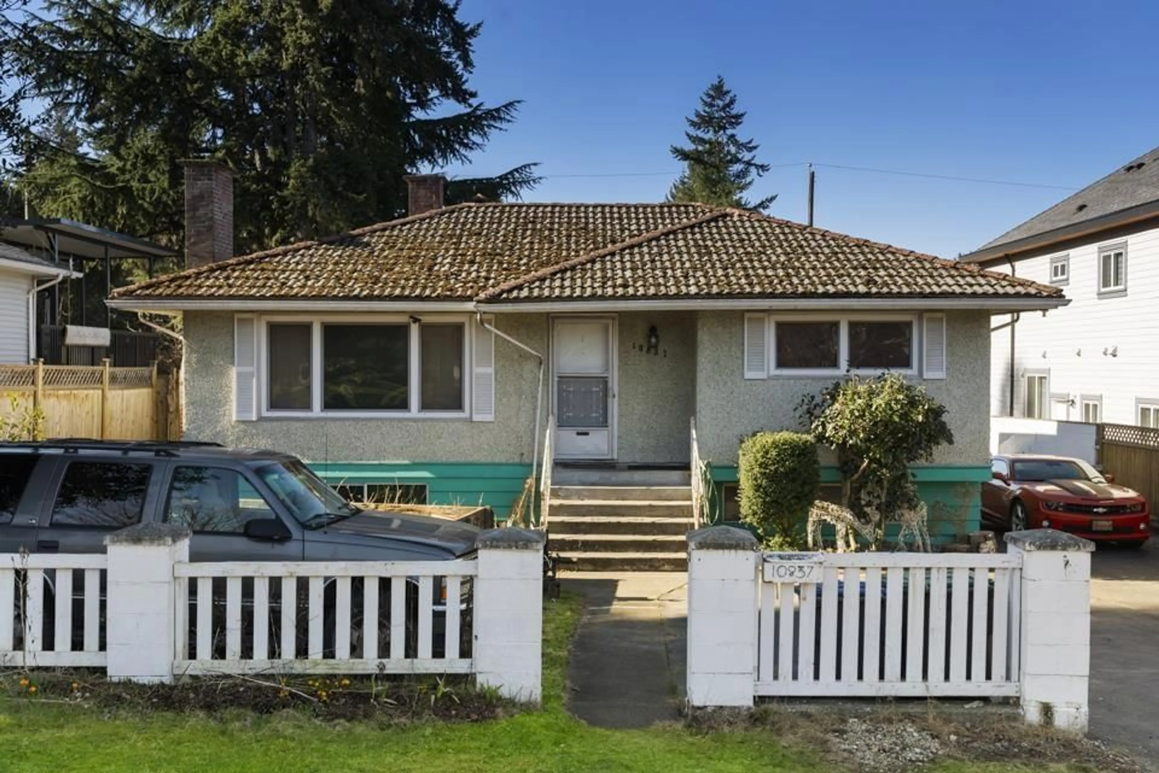 Frontside or backside of a home for 10837 128A STREET, Surrey British Columbia V3T3E9