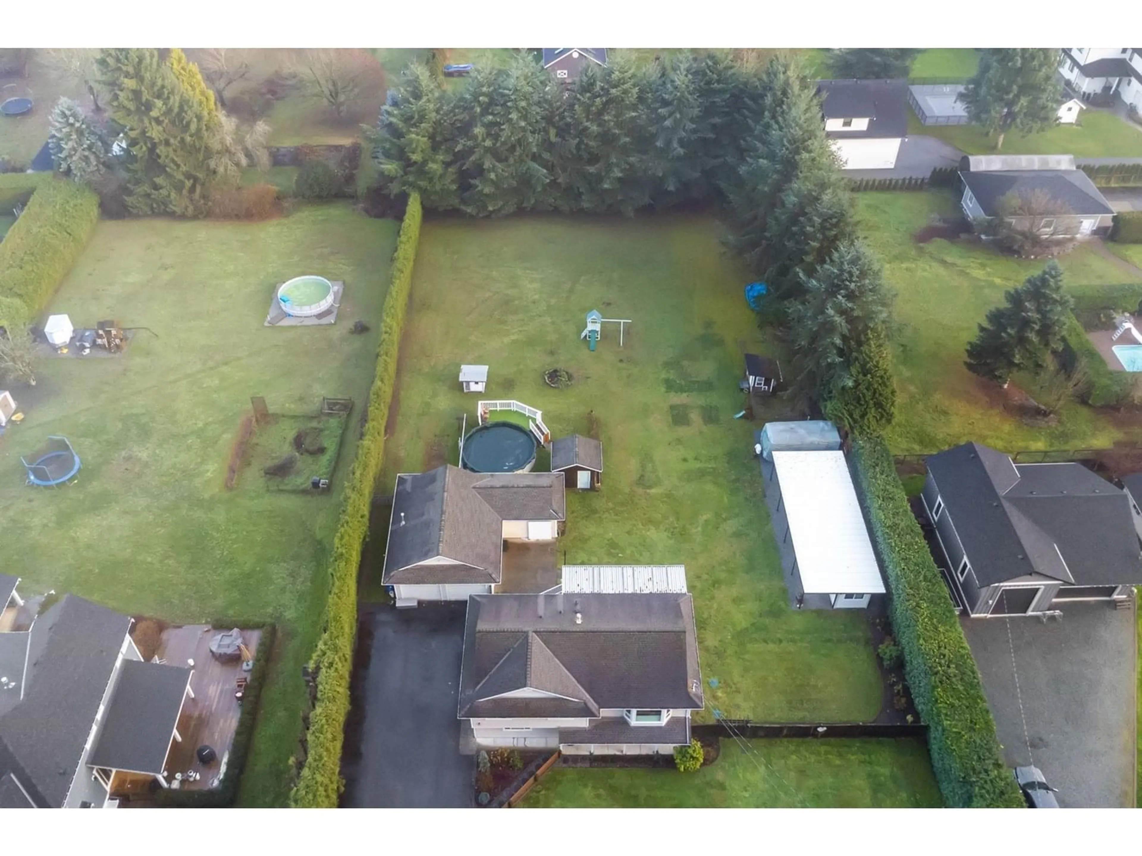 Frontside or backside of a home for 5858 242 STREET, Langley British Columbia V2Z1J8