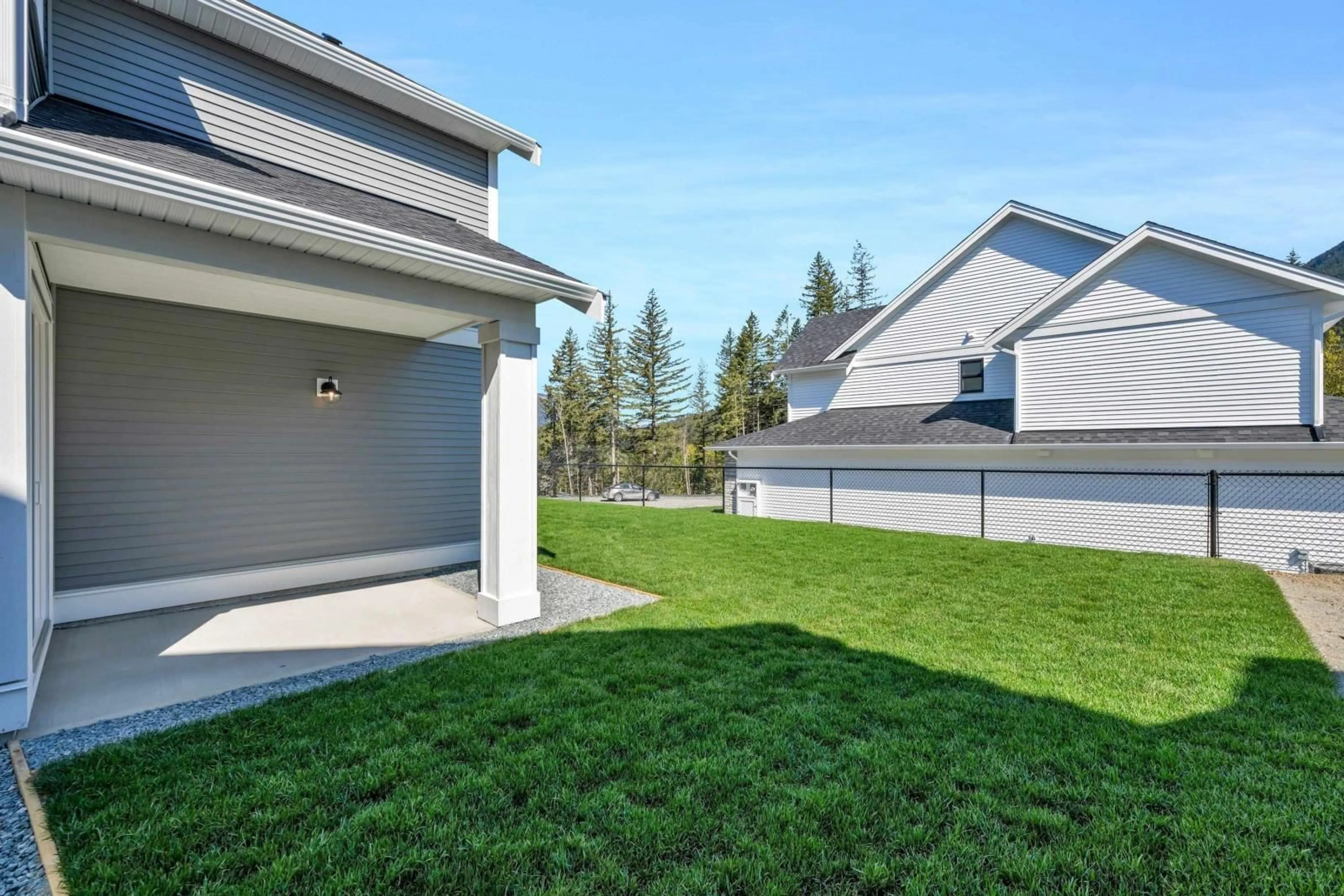 Frontside or backside of a home, the fenced backyard for 1947 WOODSIDE BOULEVARD, Agassiz British Columbia V0M1A1