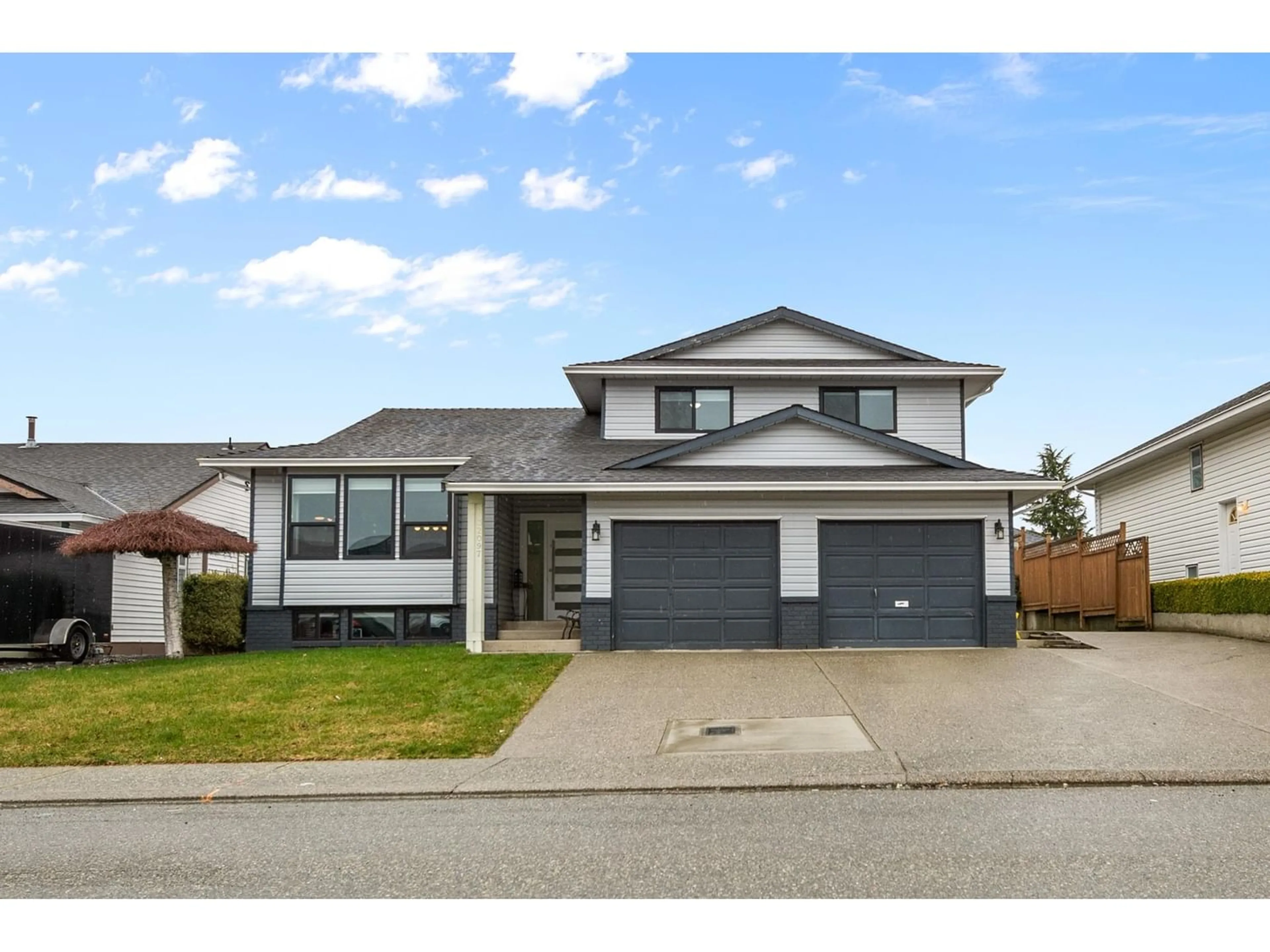 Frontside or backside of a home for 32097 BALFOUR DRIVE, Abbotsford British Columbia V2T5C2