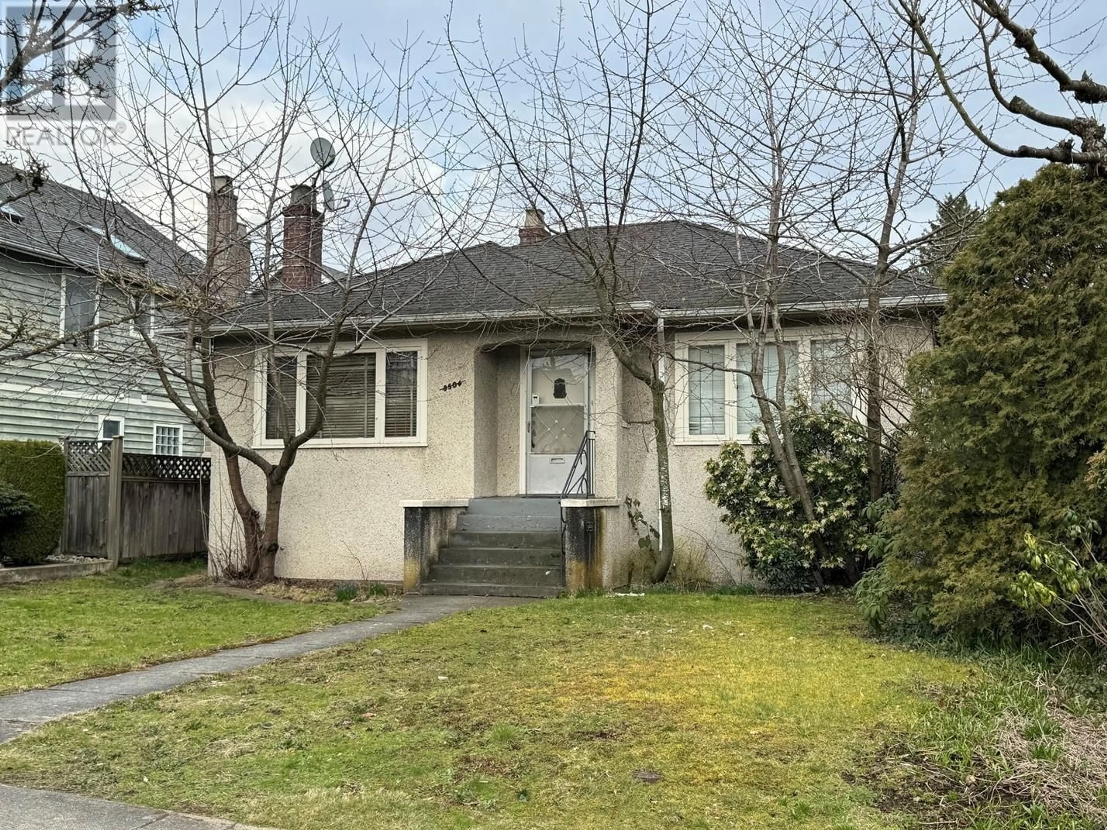 Frontside or backside of a home for 8504 MONTCALM STREET, Vancouver British Columbia V6P4P7