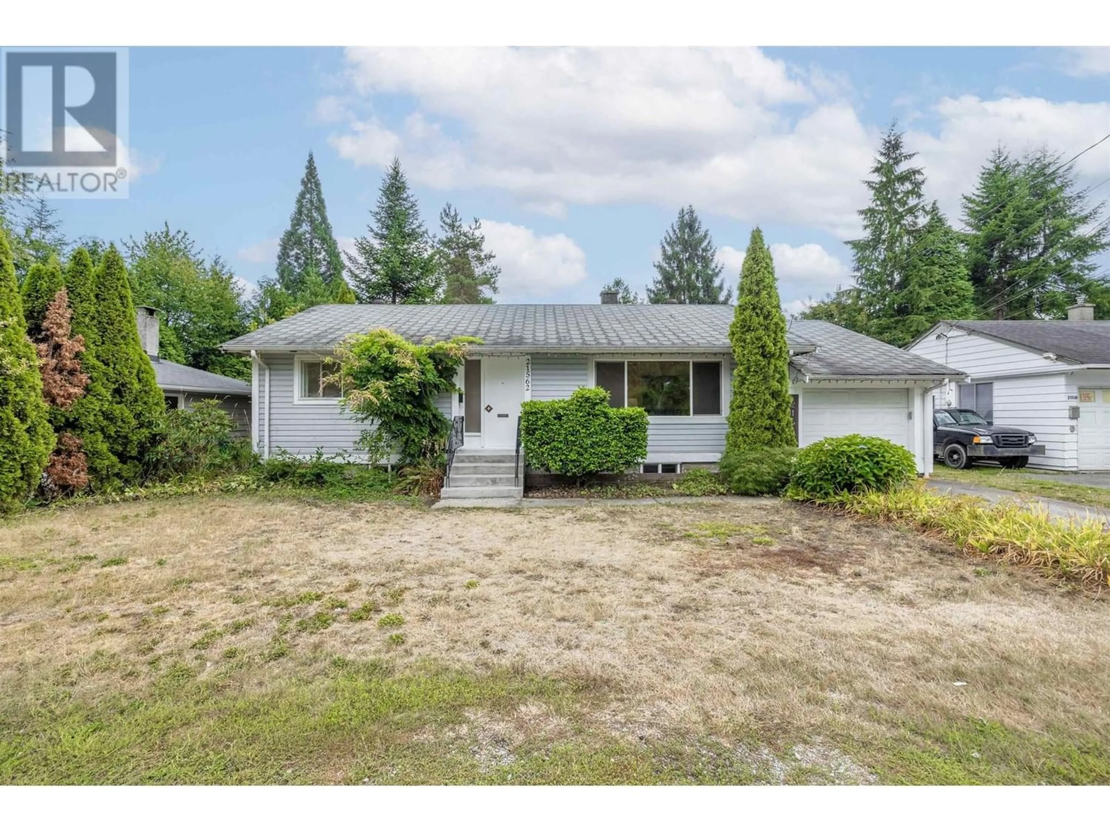 Frontside or backside of a home for 21562 123 AVENUE, Maple Ridge British Columbia V2X4C2
