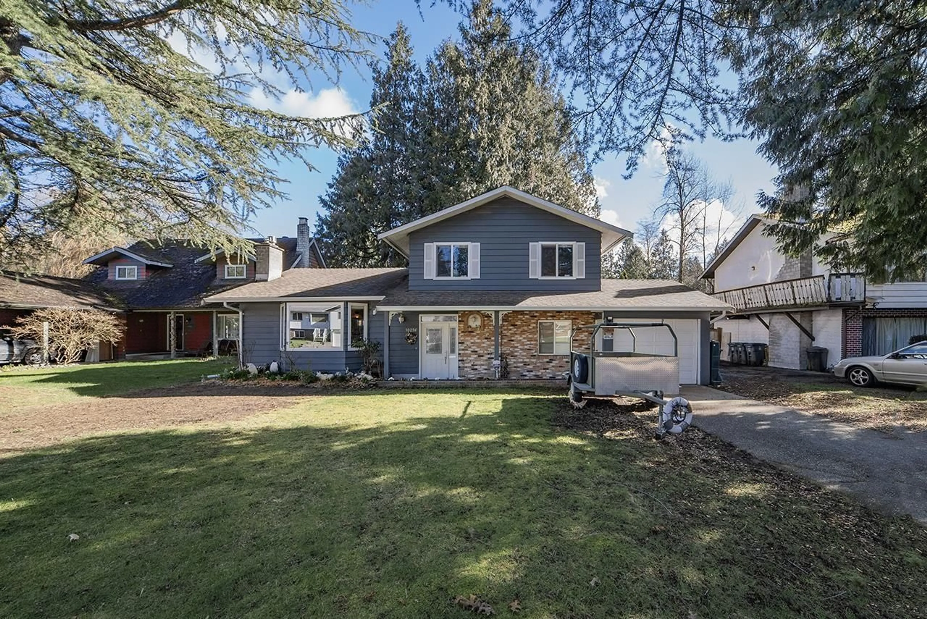 Frontside or backside of a home for 10256 145 STREET, Surrey British Columbia V3R6M9