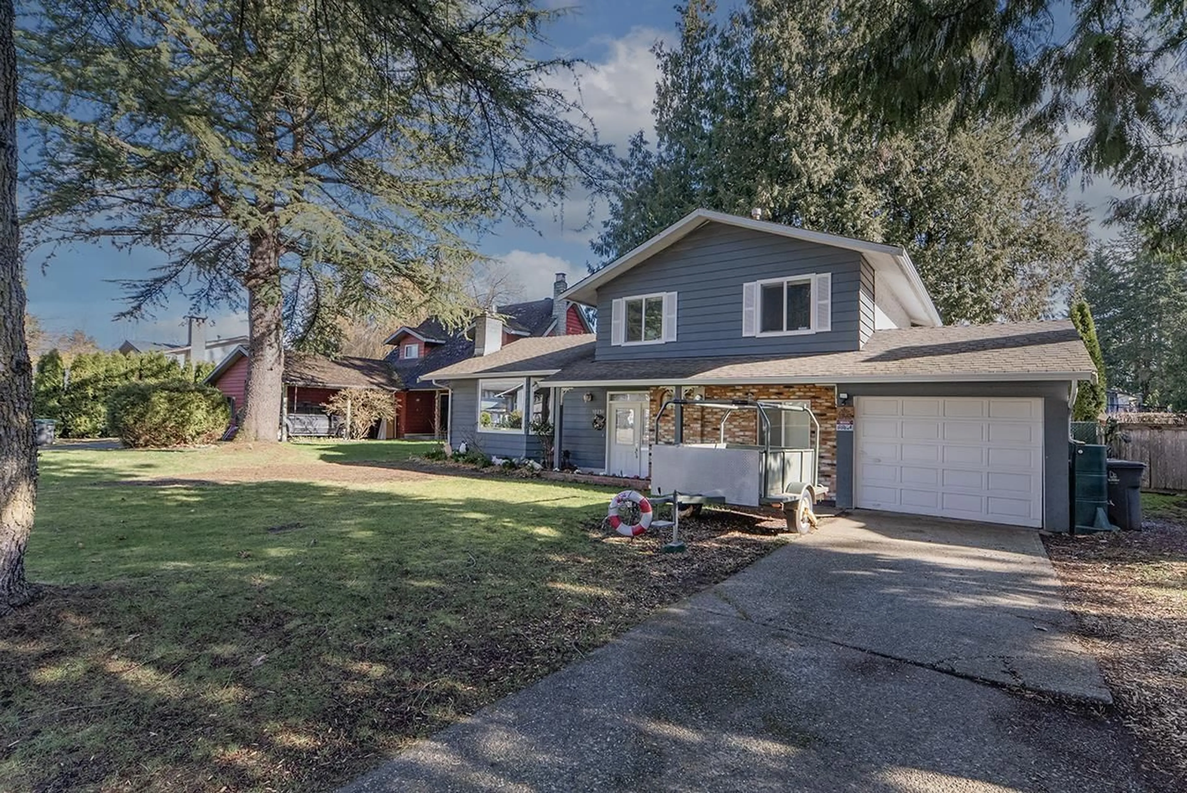 Frontside or backside of a home for 10256 145 STREET, Surrey British Columbia V3R6M9