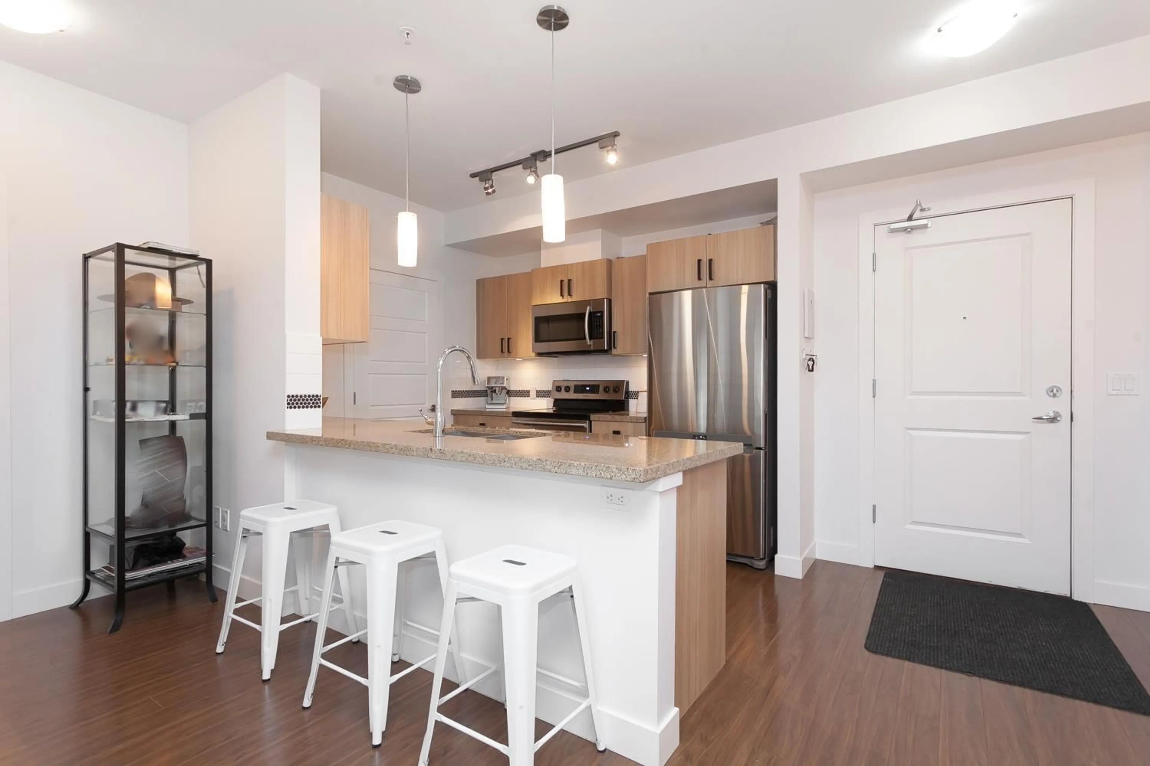 Open concept kitchen, wood/laminate floor for 209 - 20219 54A, Langley British Columbia V3A0C7