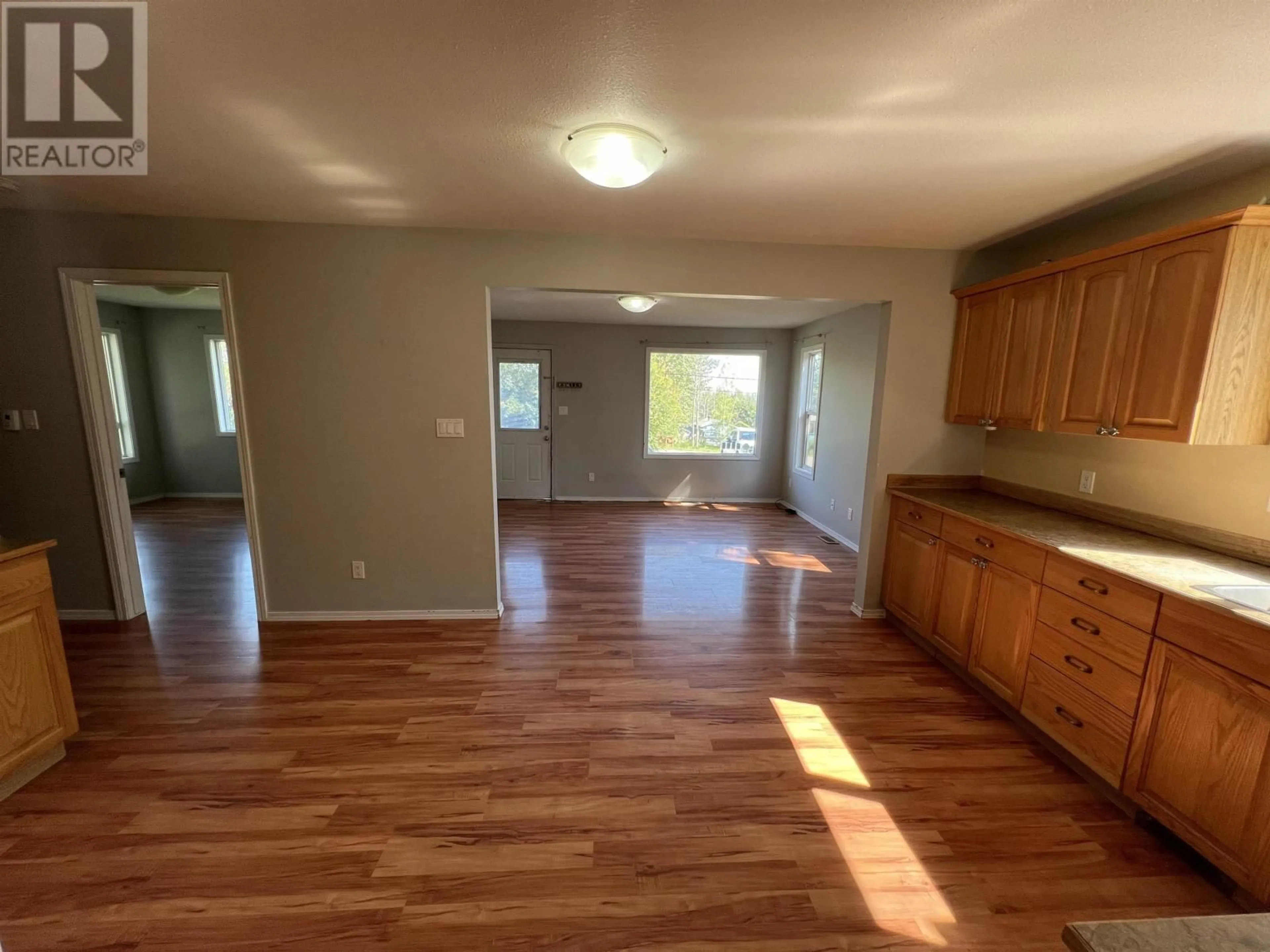 A pic of a room, wood floors for 5203 52 STREET, Fort Nelson British Columbia V0C1R0