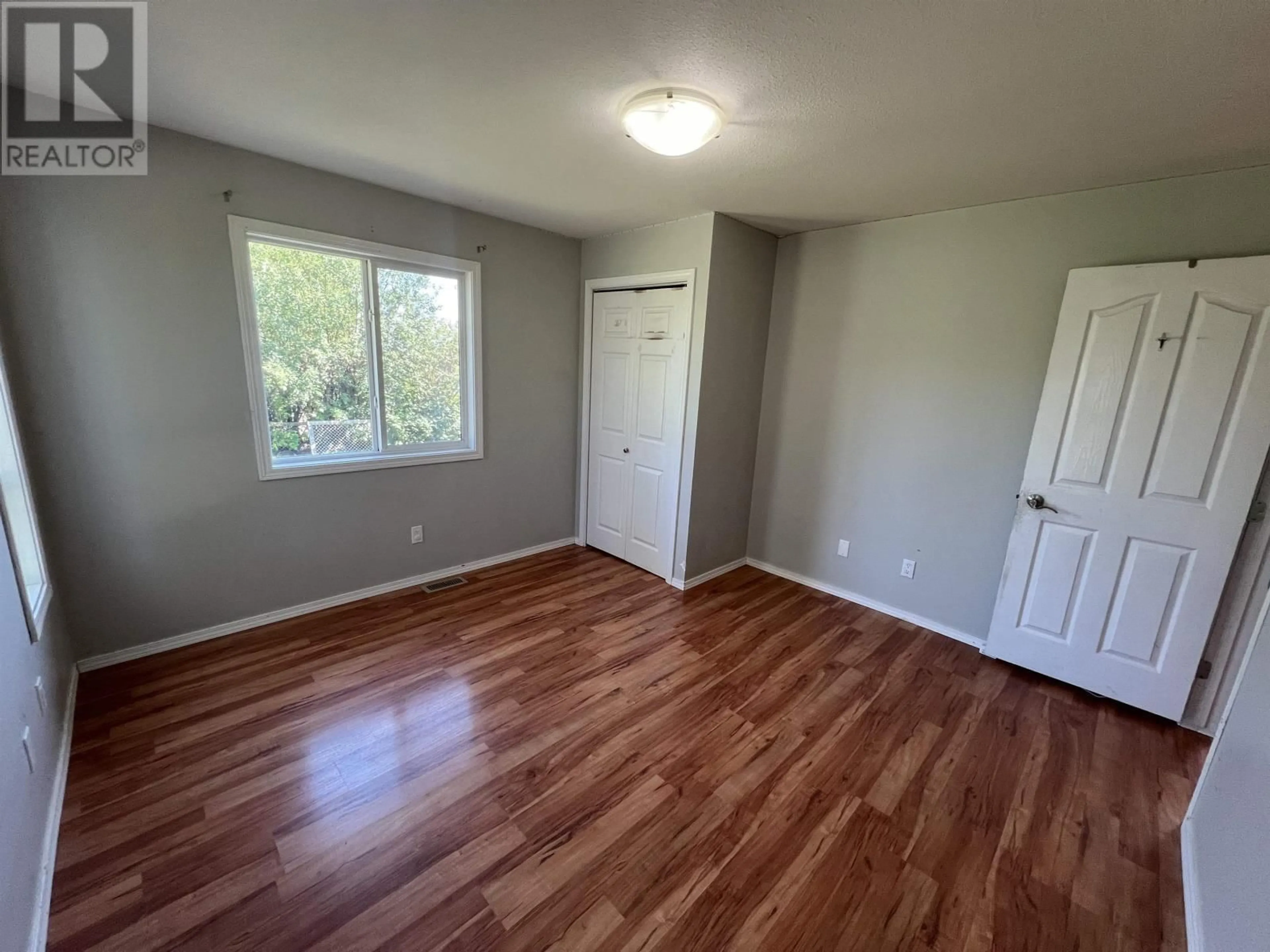 A pic of a room, wood floors for 5203 52 STREET, Fort Nelson British Columbia V0C1R0