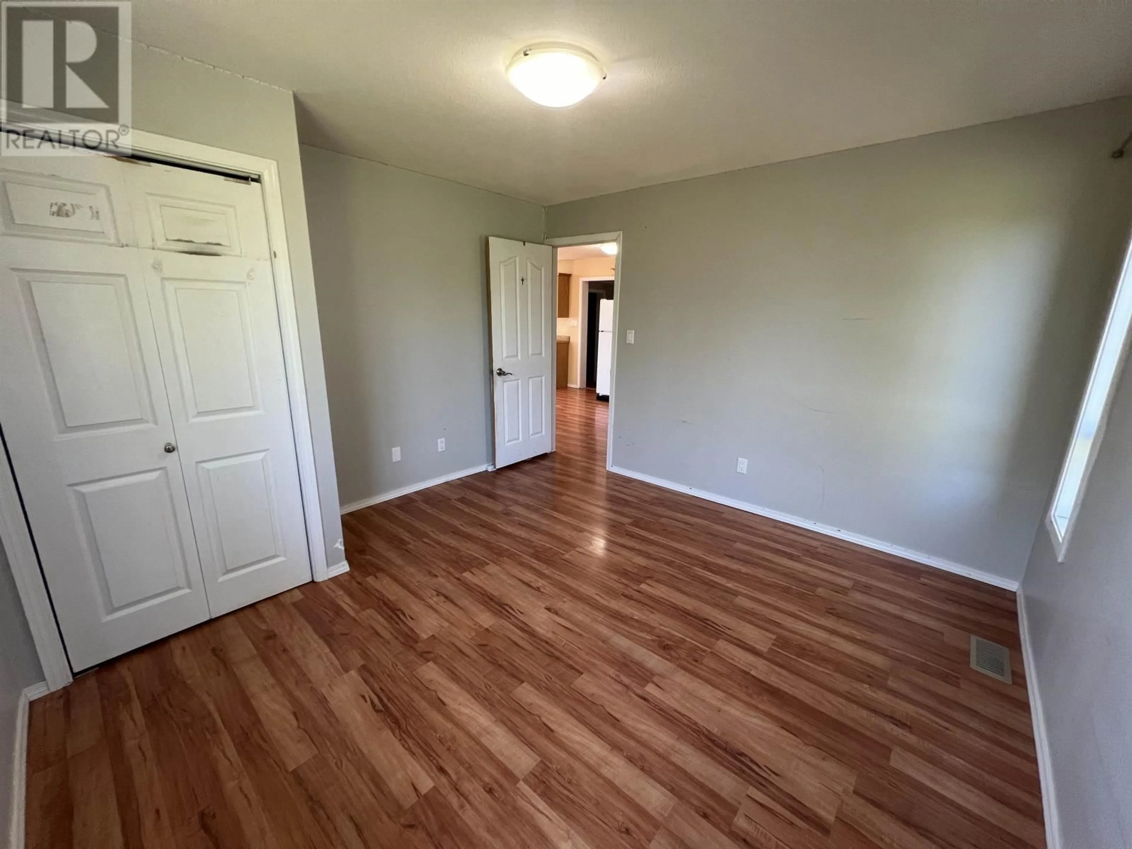 A pic of a room, wood floors for 5203 52 STREET, Fort Nelson British Columbia V0C1R0