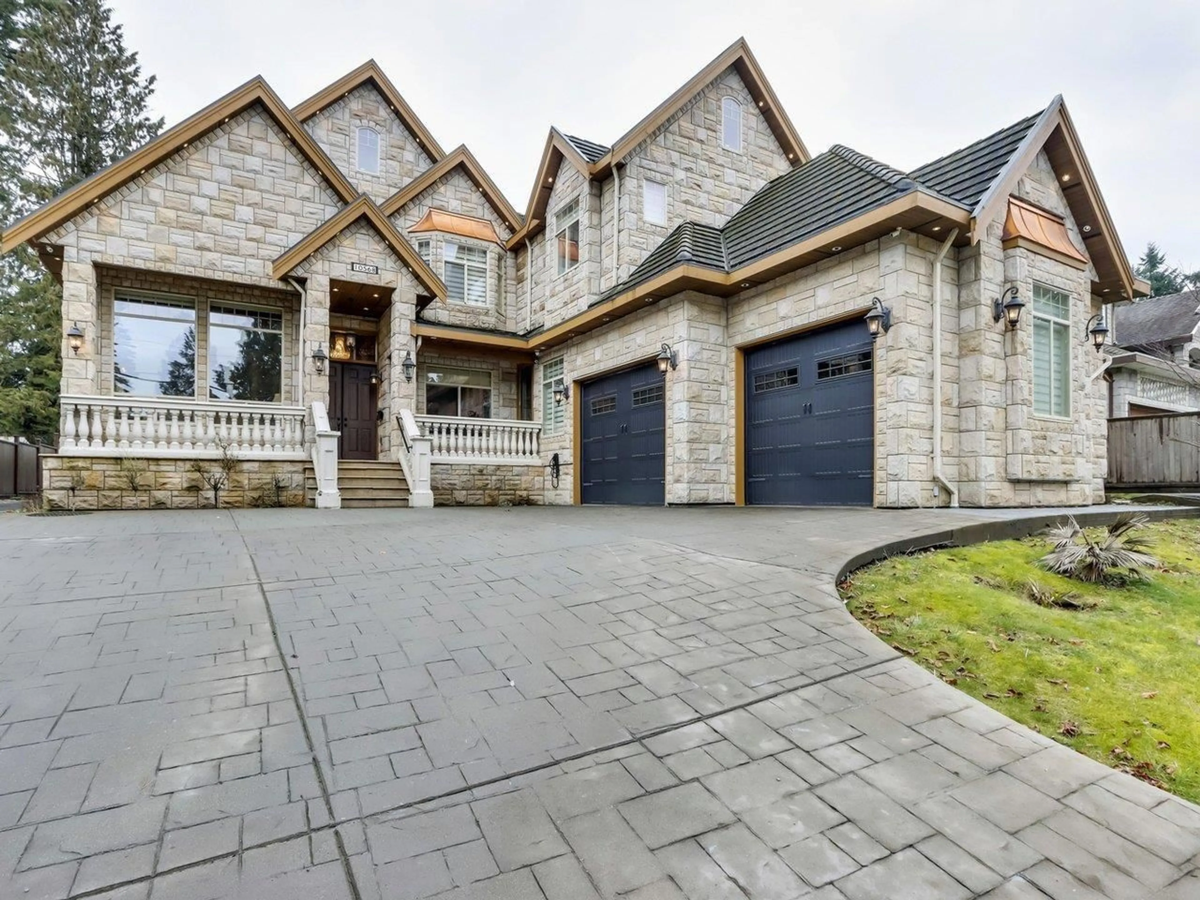 Home with brick exterior material for 10568 127 STREET, Surrey British Columbia V3V5K2