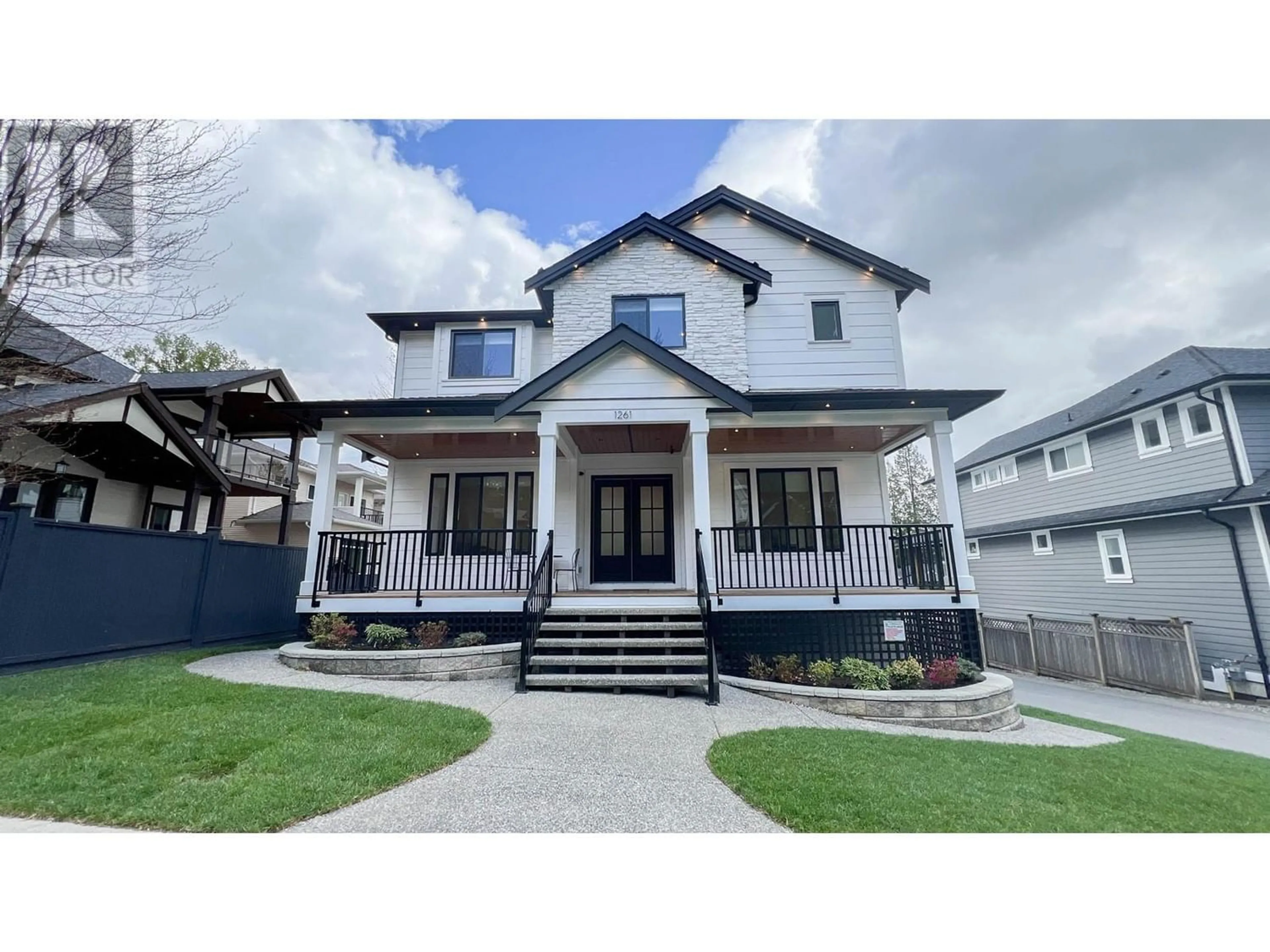 Frontside or backside of a home for 1261 RAVENSDALE STREET, Coquitlam British Columbia V3B7M9