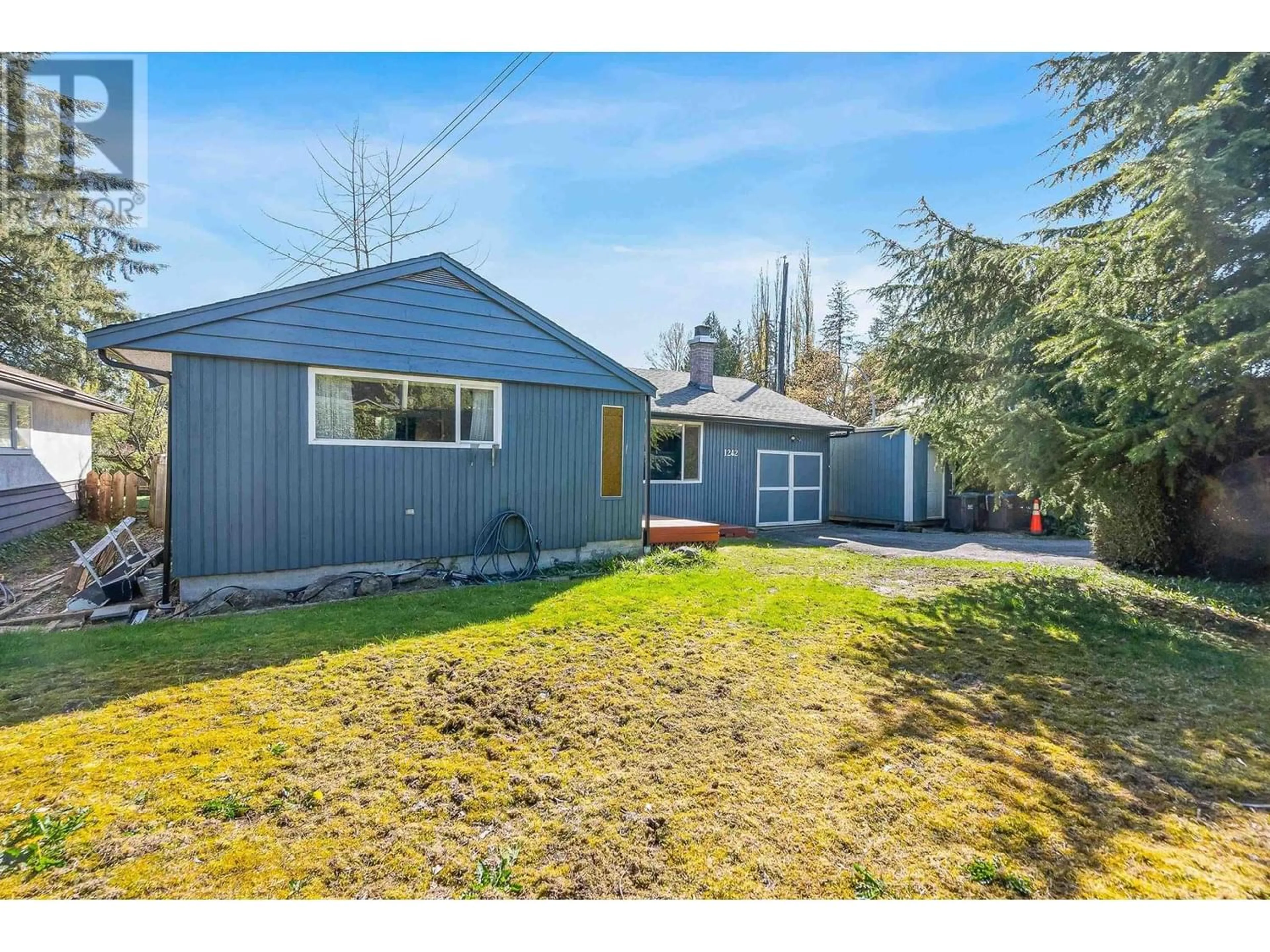 Frontside or backside of a home for 1242 PRAIRIE AVENUE, Port Coquitlam British Columbia V3B1S8