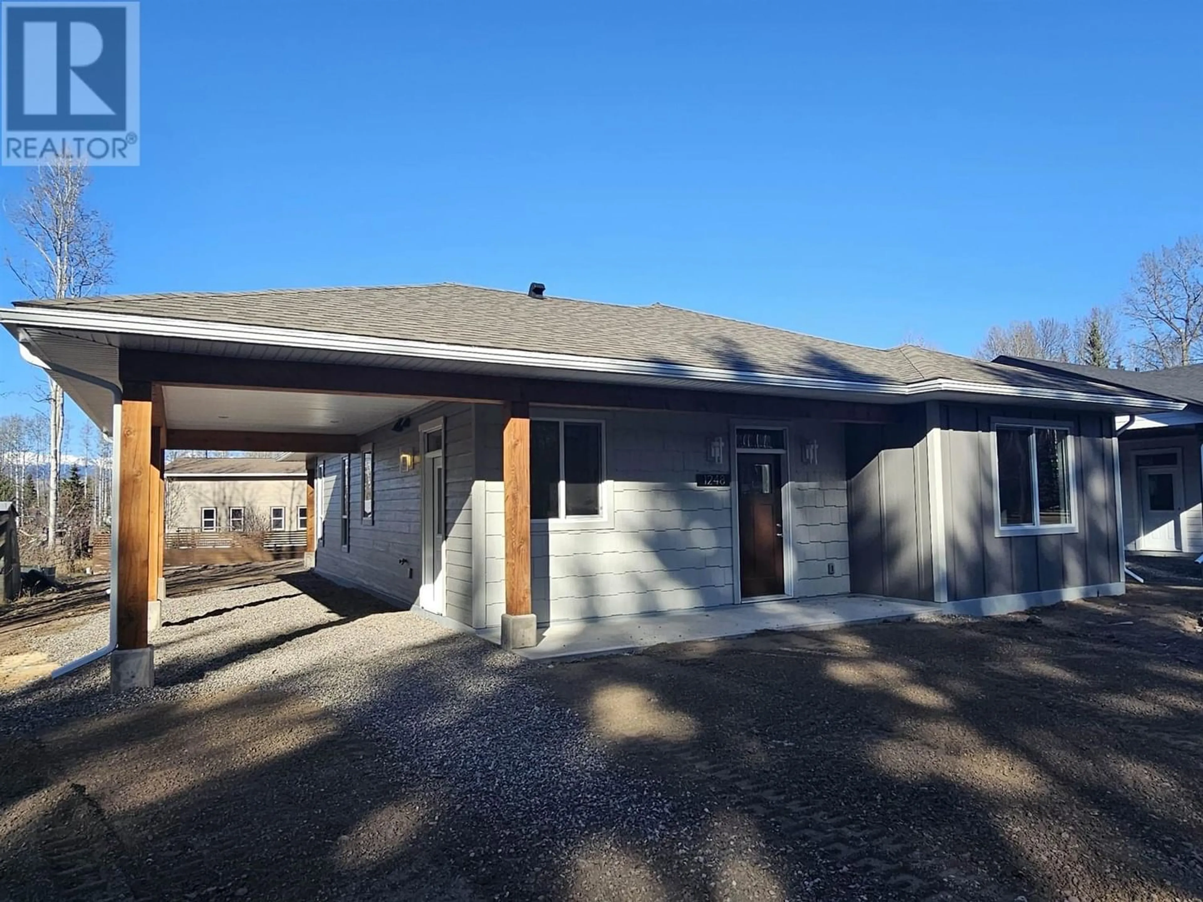 Frontside or backside of a home, the front or back of building for 1248 FIR STREET, Telkwa British Columbia V0J2X0