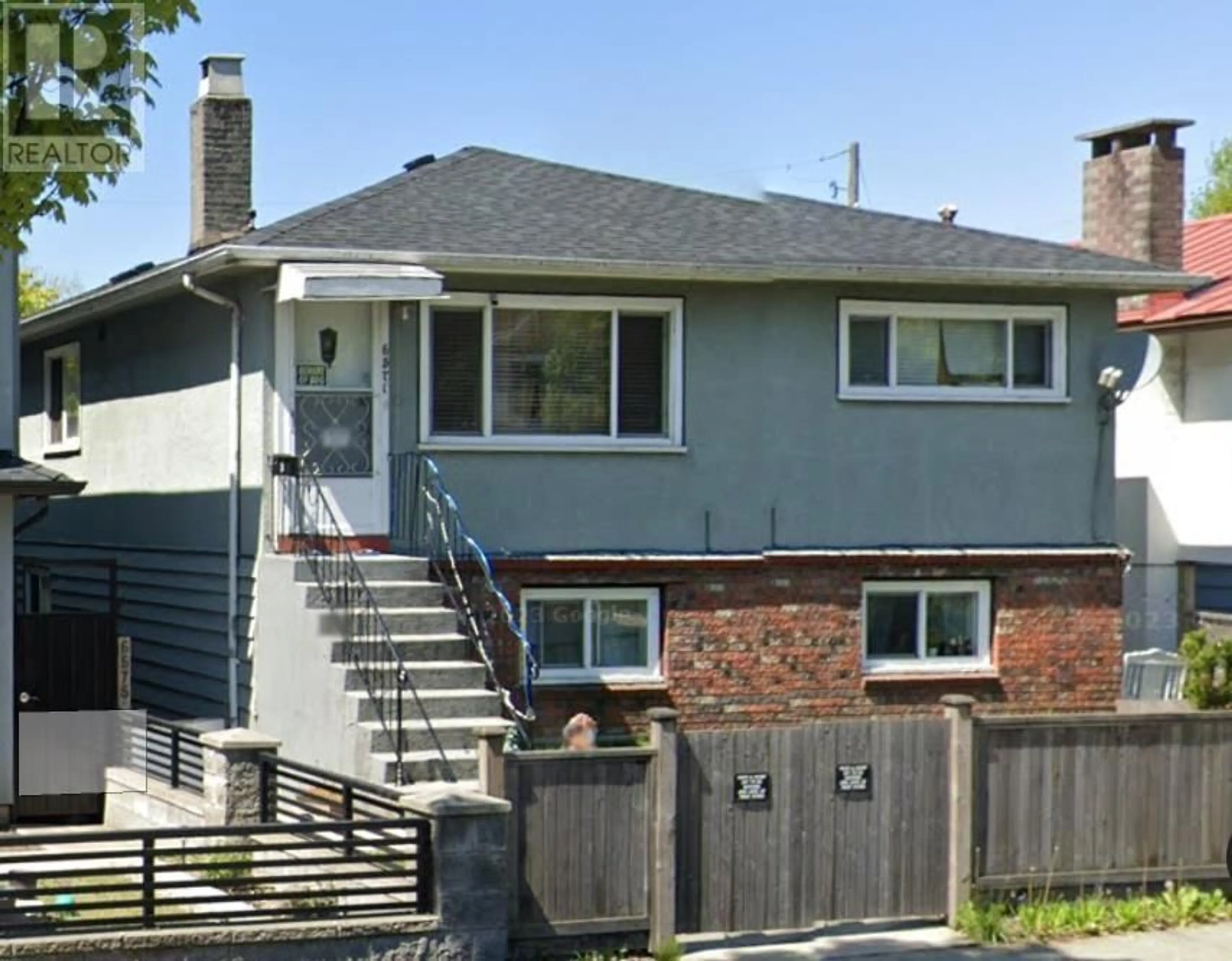 Frontside or backside of a home for 6571 KNIGHT STREET, Vancouver British Columbia V5P2W1