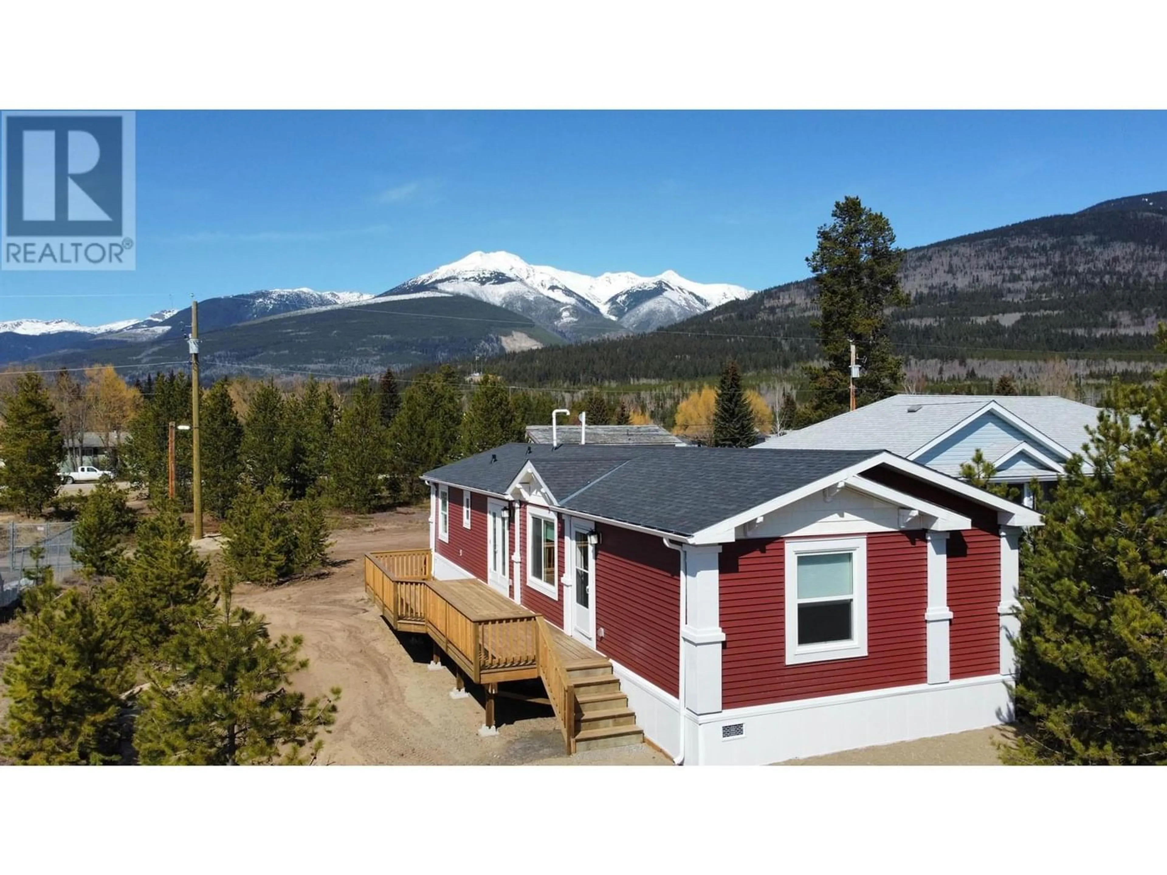 Home with vinyl exterior material for 1170 9TH AVENUE, Valemount British Columbia V0E2Z0