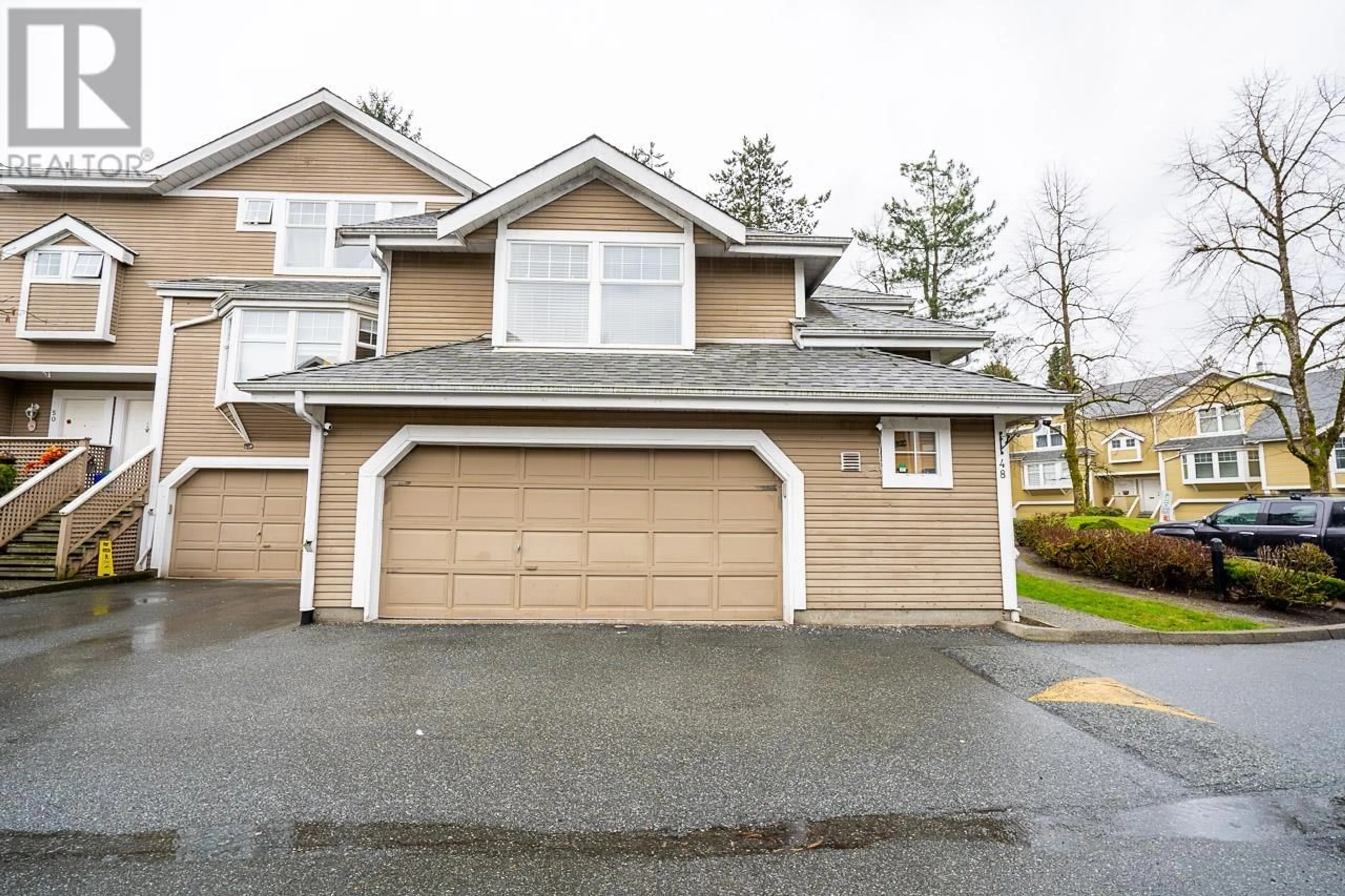 A pic from exterior of the house or condo for 48 1140 FALCON DRIVE, Coquitlam British Columbia V3E2J9