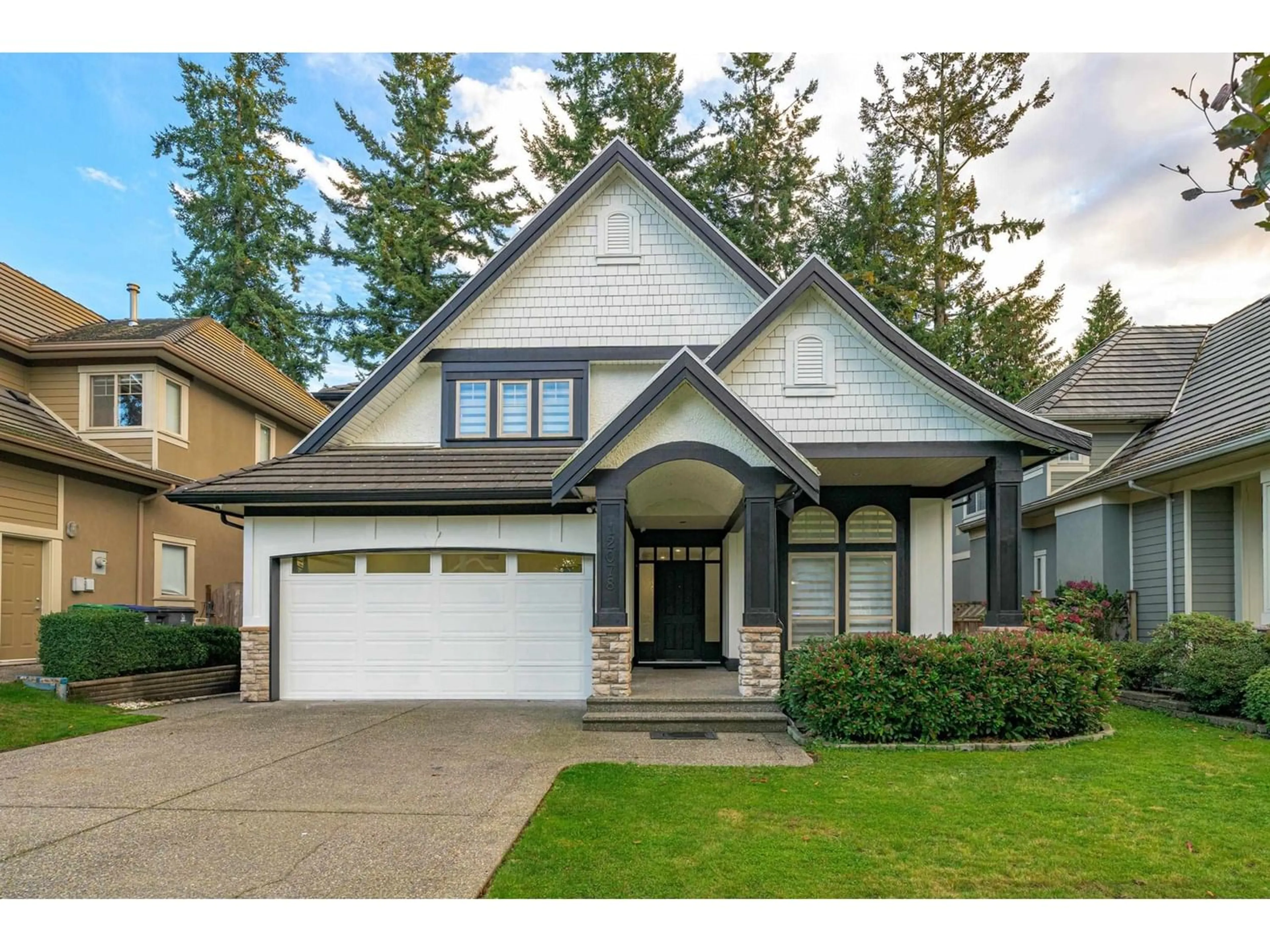 Frontside or backside of a home for 12078 59 AVENUE, Surrey British Columbia V3X3L3