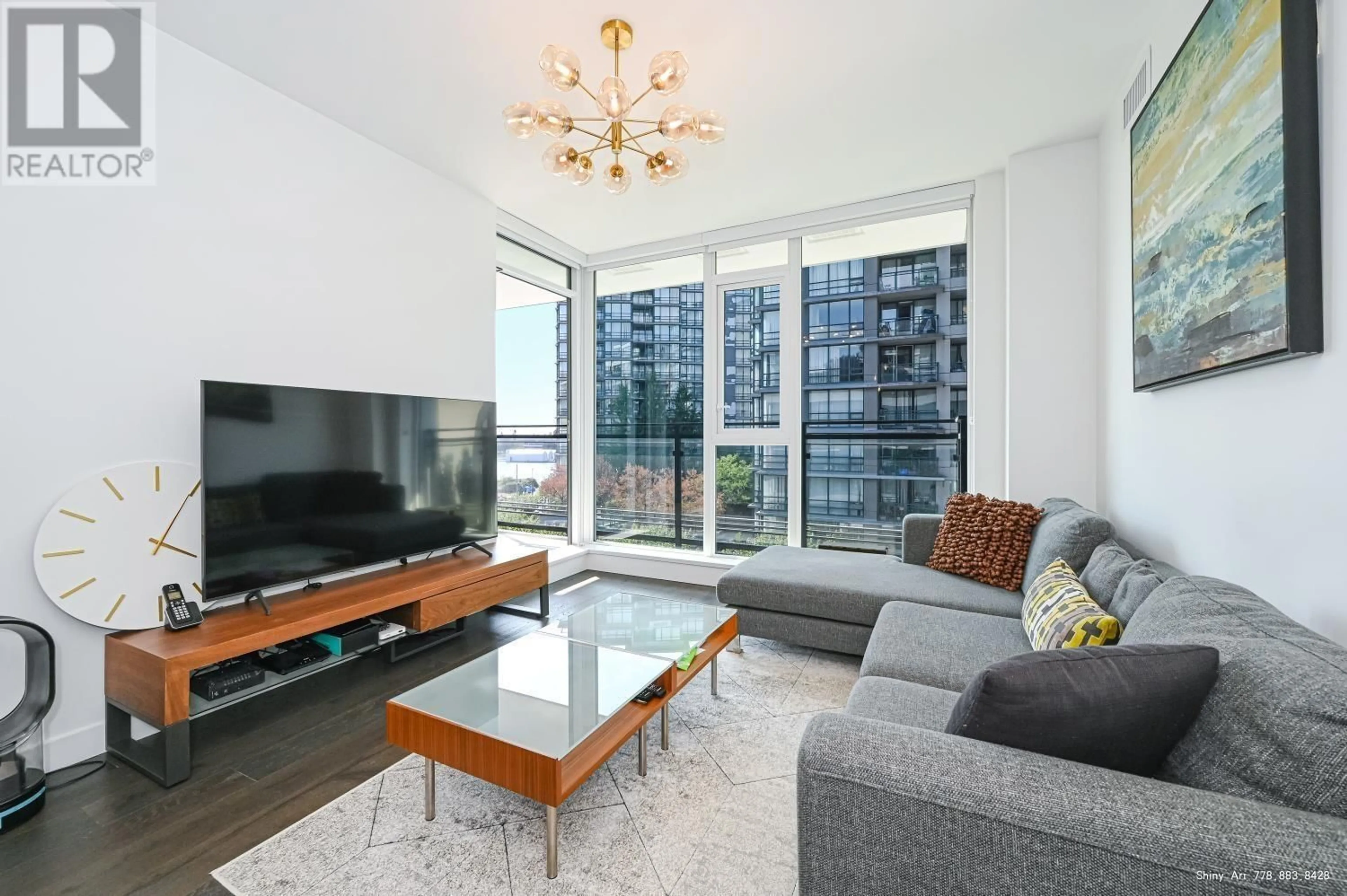 Living room, wood floors for 701 3200 CORVETTE WAY, Richmond British Columbia V6X0T8